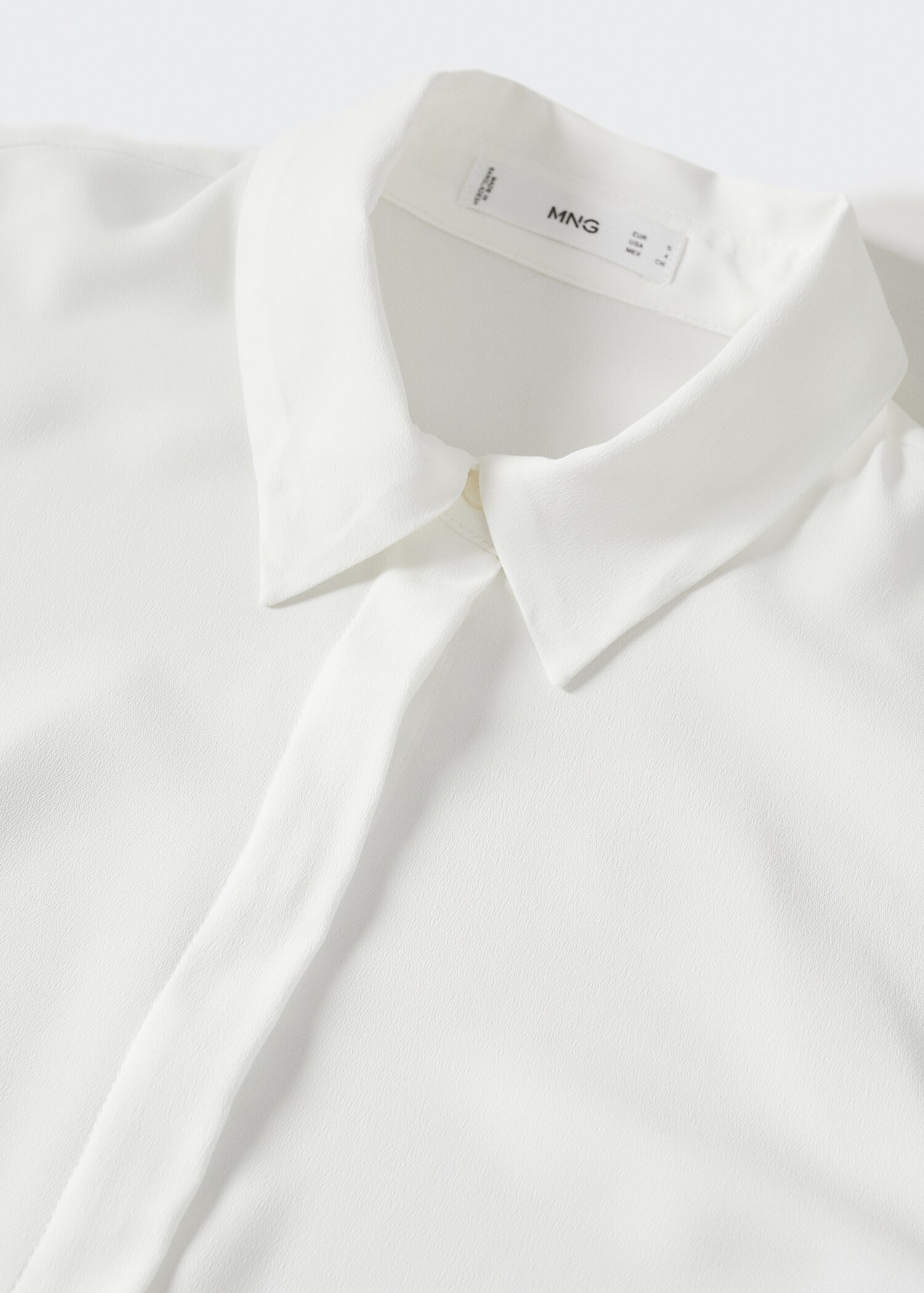 Buttoned flowy shirt - Details of the article 8