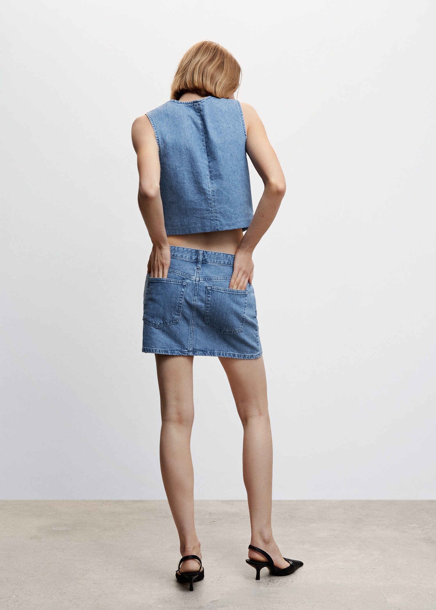 Denim gilet with seams - Reverse of the article