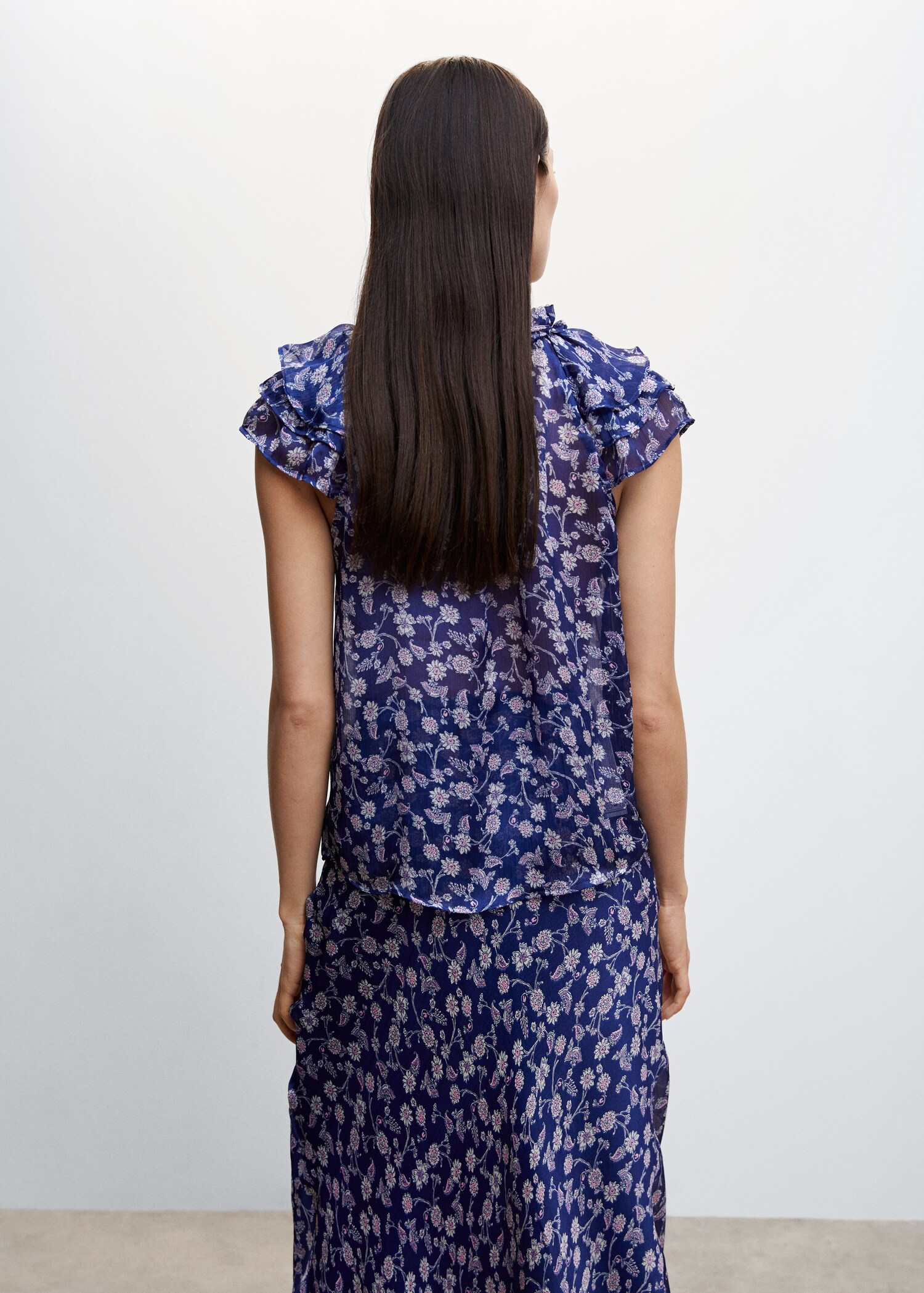 Blusa floral volantes - Reverso del artículo