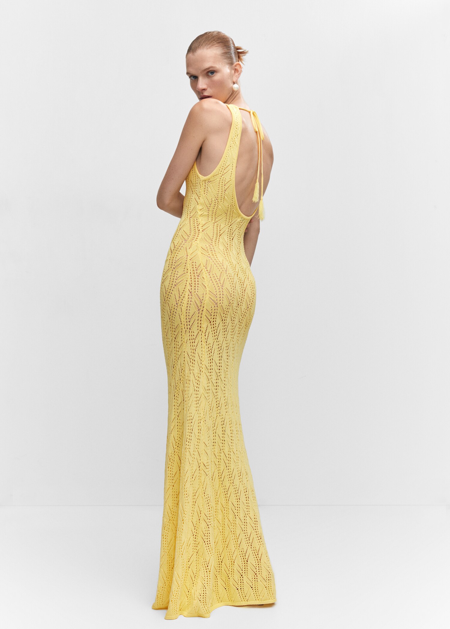 Open-work long dress - Reverse of the article