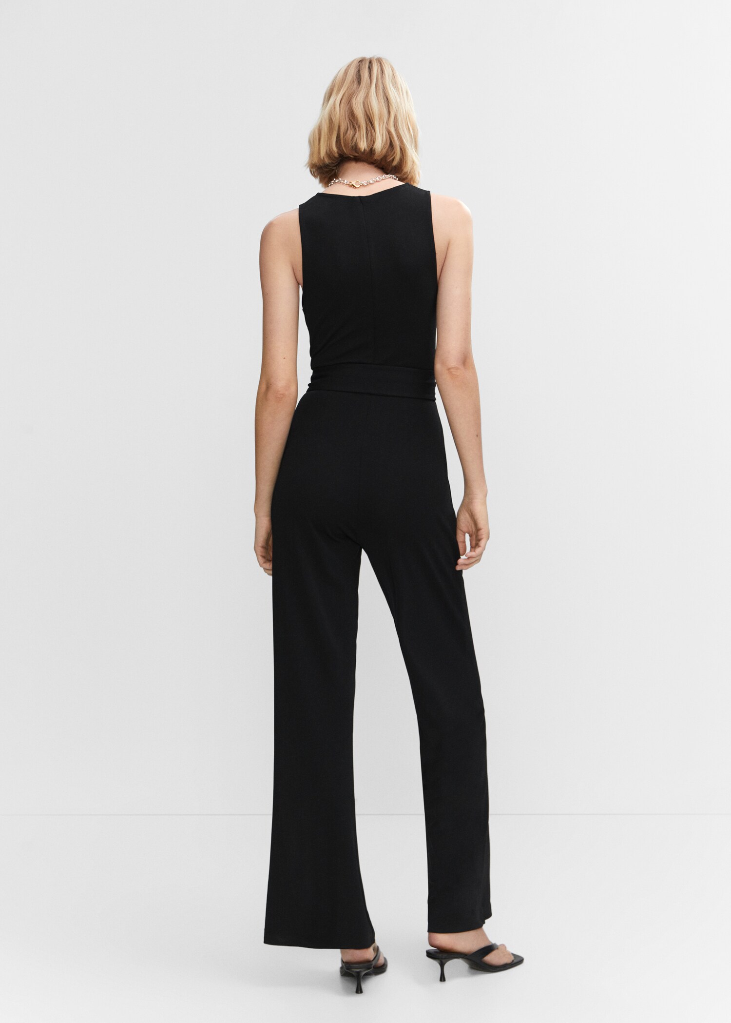 Bow long jumpsuit - Reverse of the article