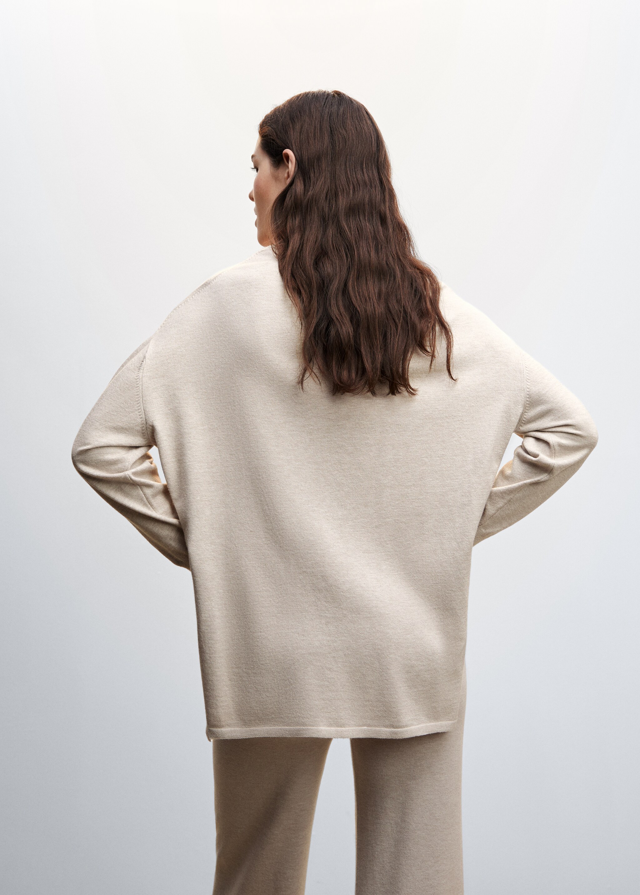 Side slits sweater - Reverse of the article