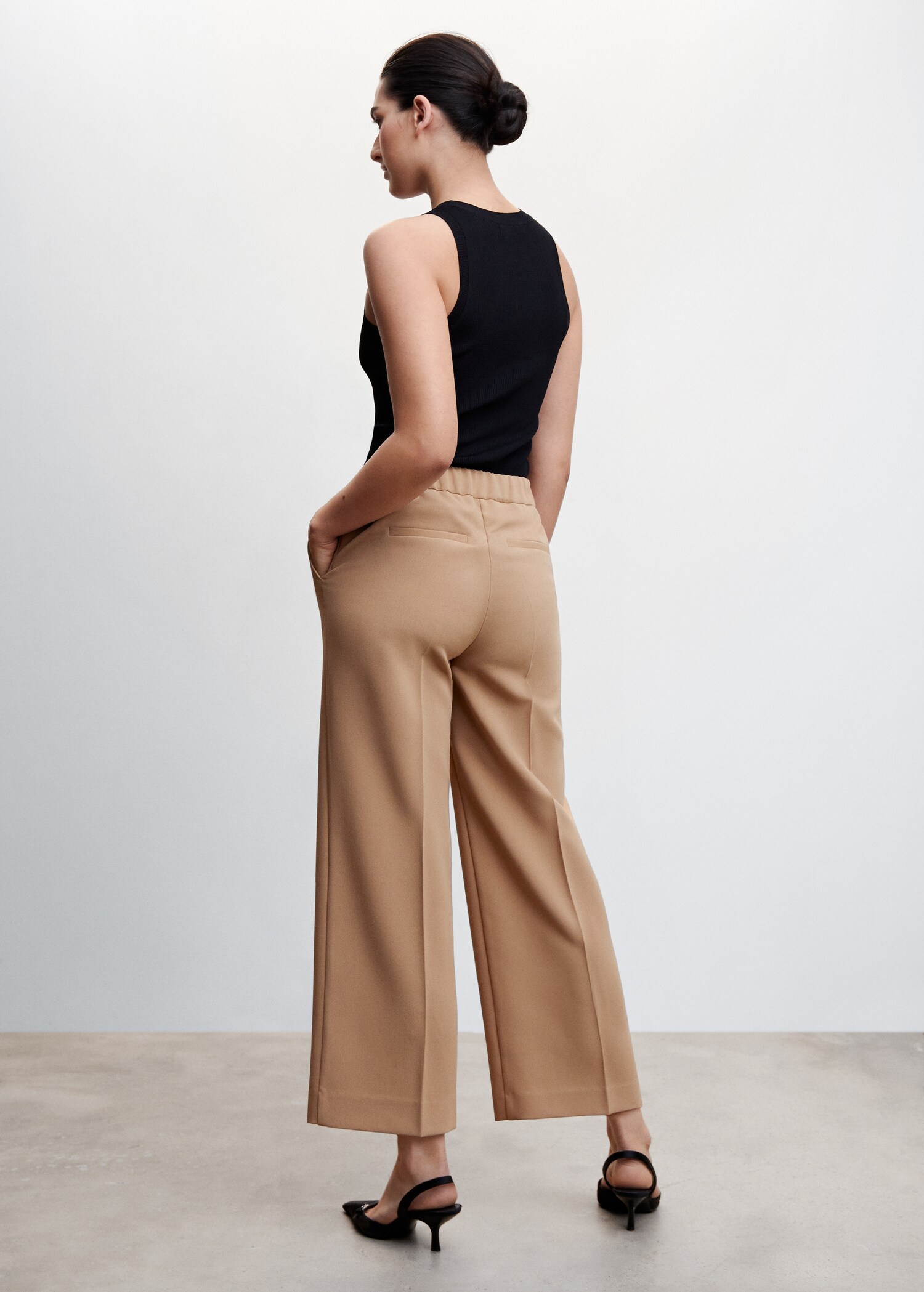 Cropped button trousers - Reverse of the article