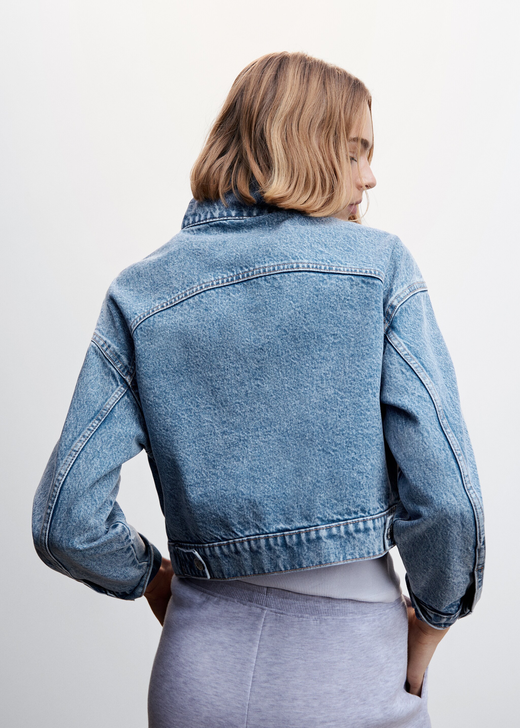 Pocketed denim jacket - Reverse of the article