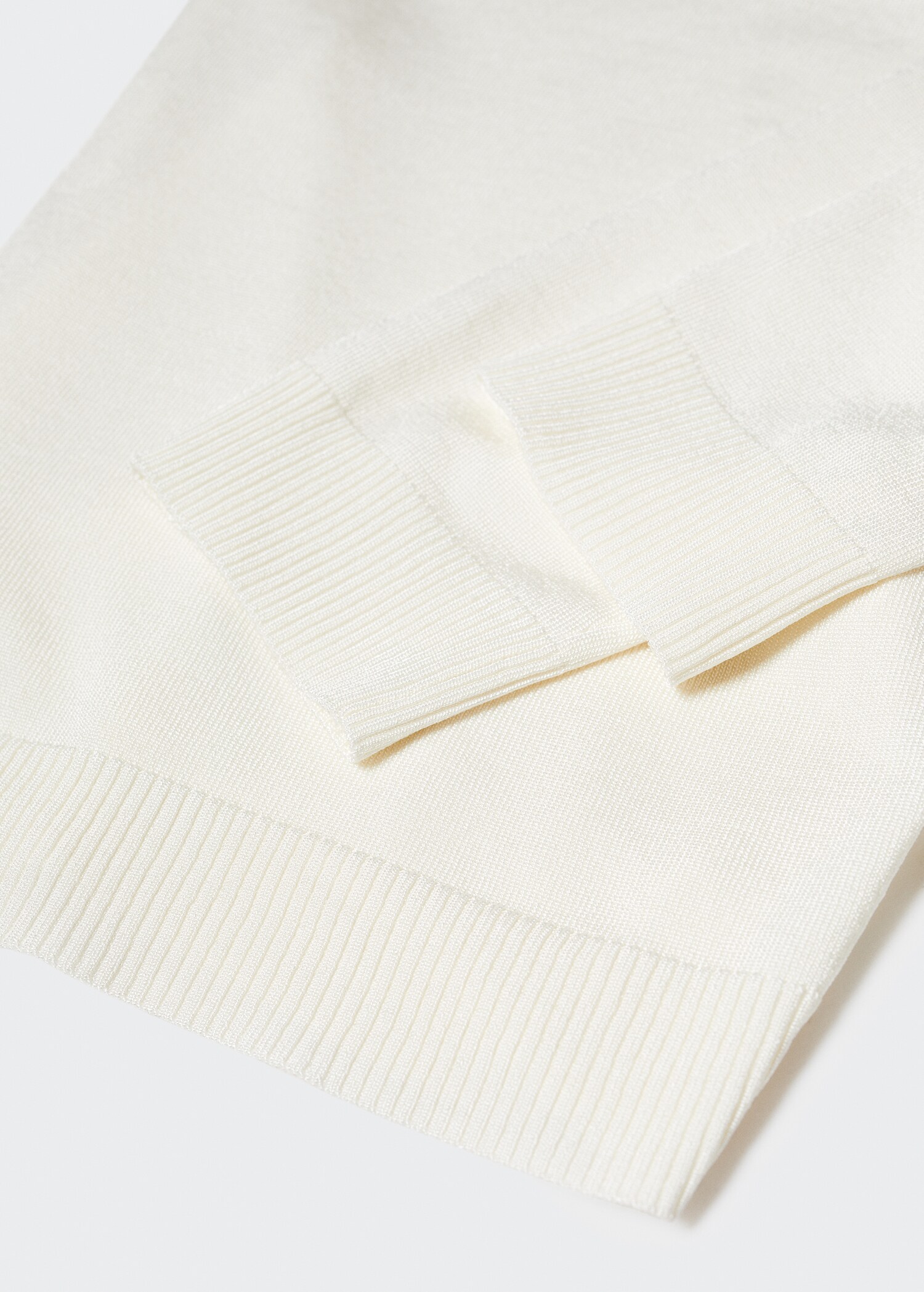 Jersey punto fino cuello pico - Detalle del artículo 8