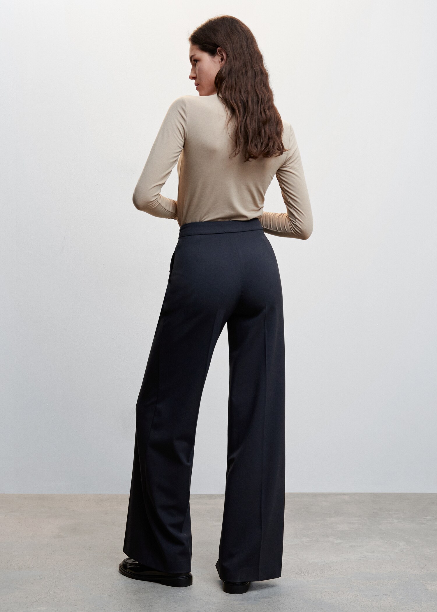 Side buttons trousers - Reverse of the article