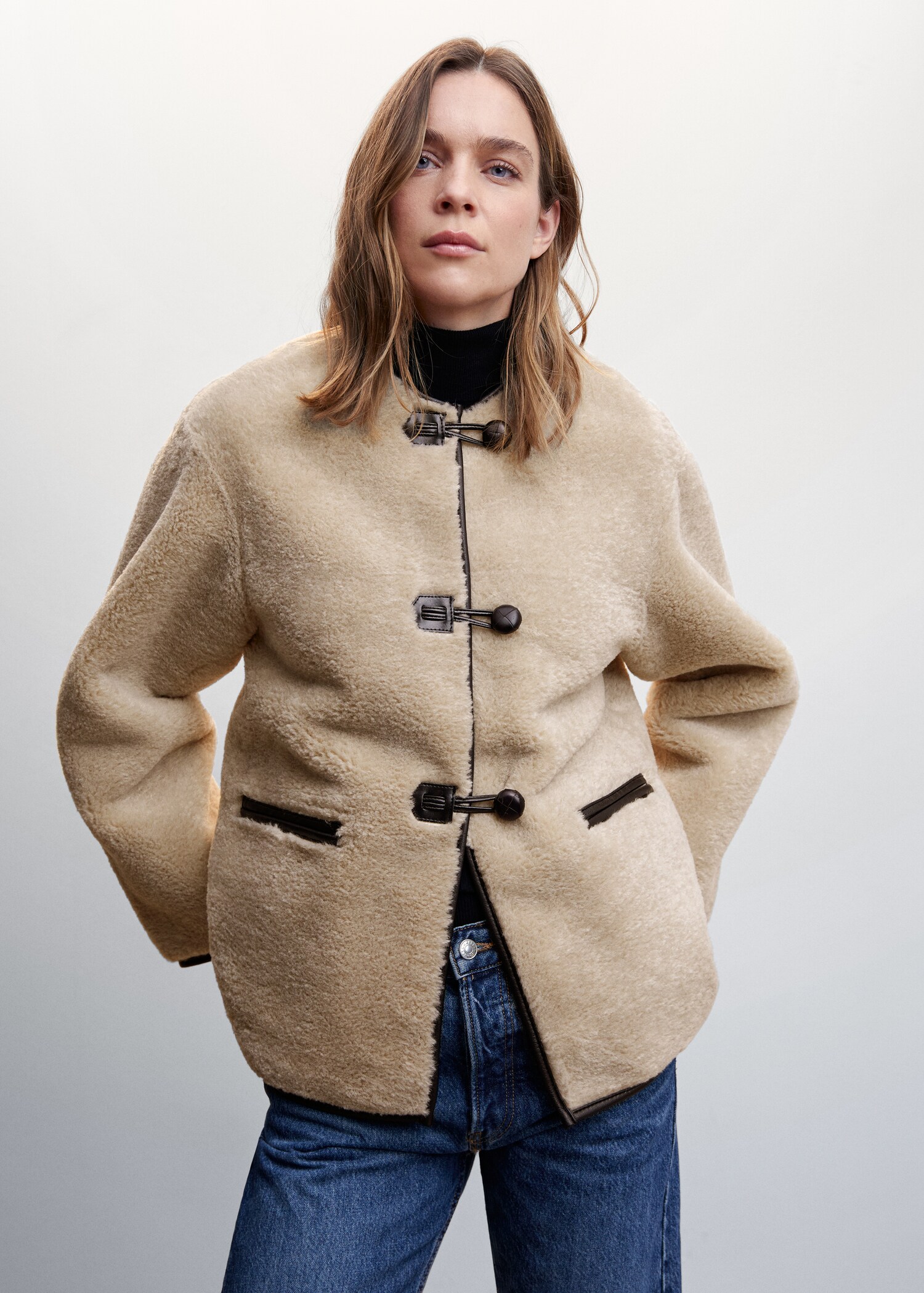 Fur-effect coat with appliqués - Medium plane