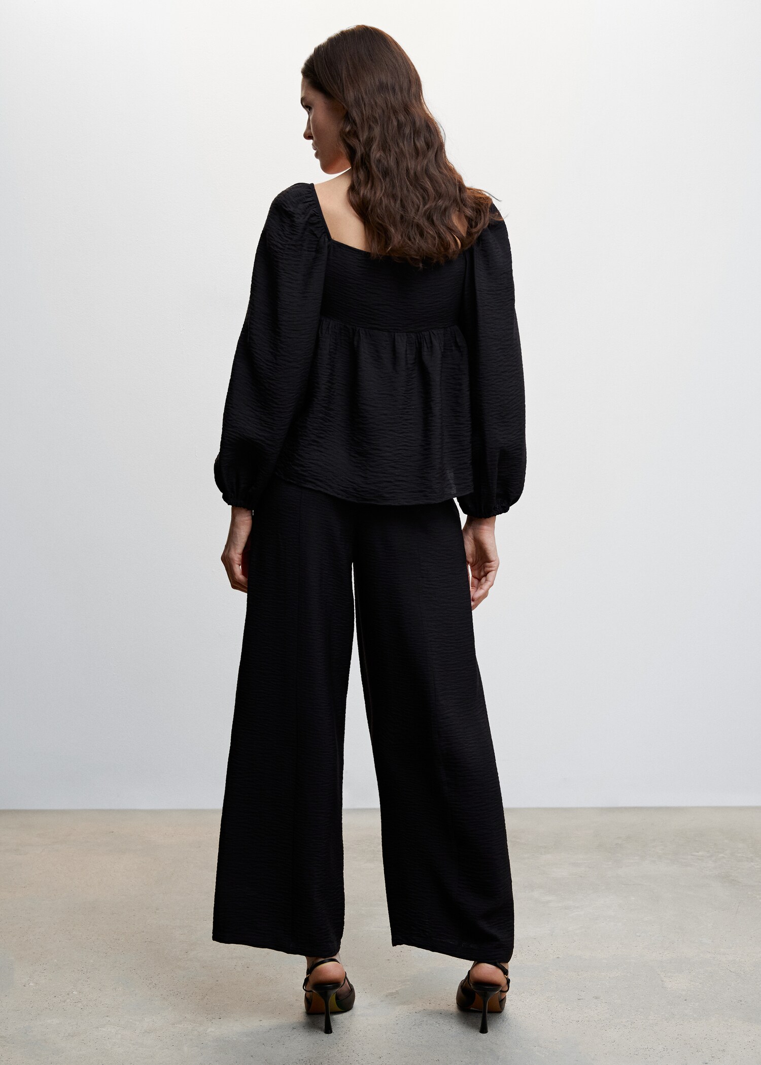 Textured flowy trousers - Reverse of the article
