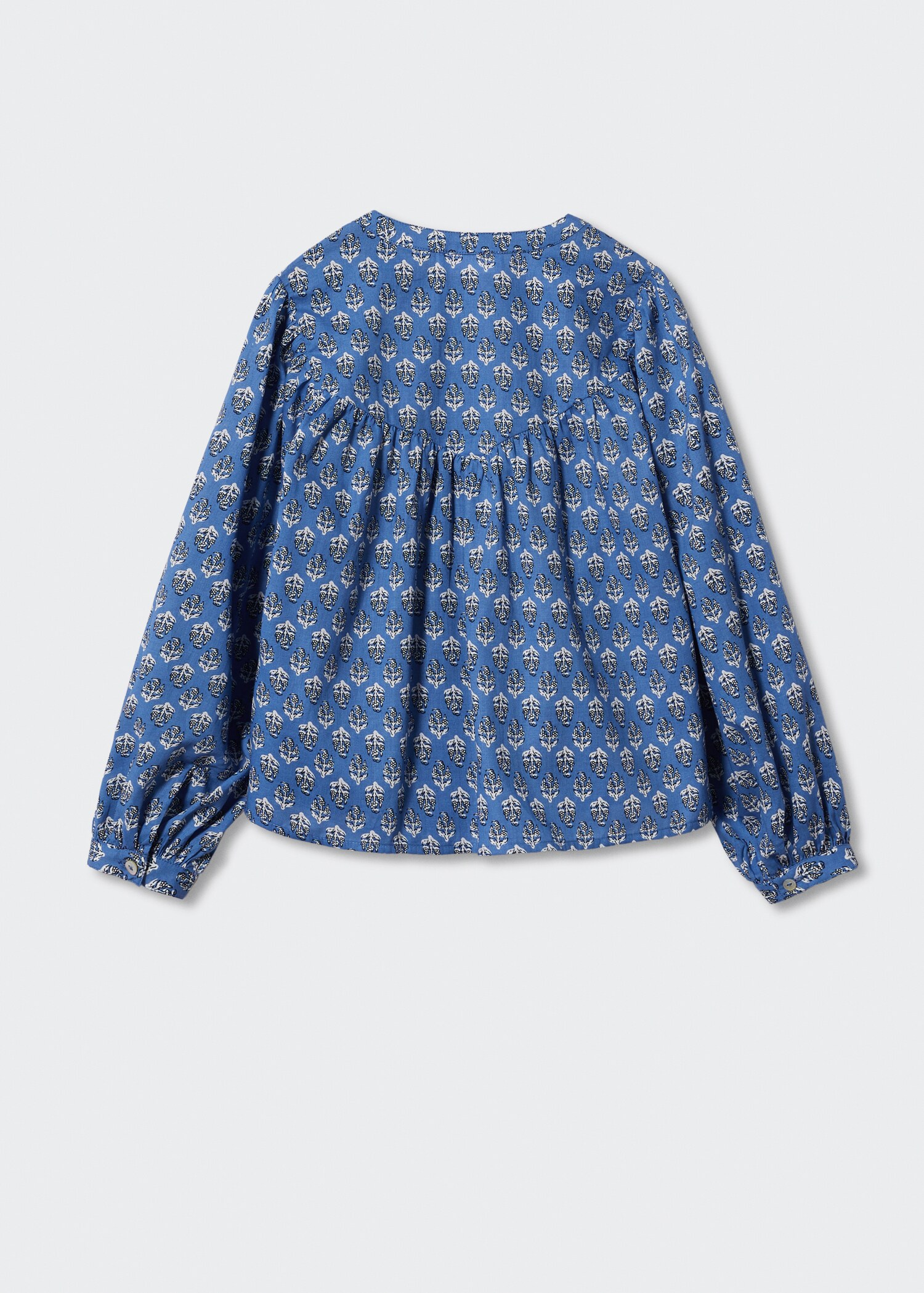 Bluse med blomstertrykk - Baksiden av artikkelen