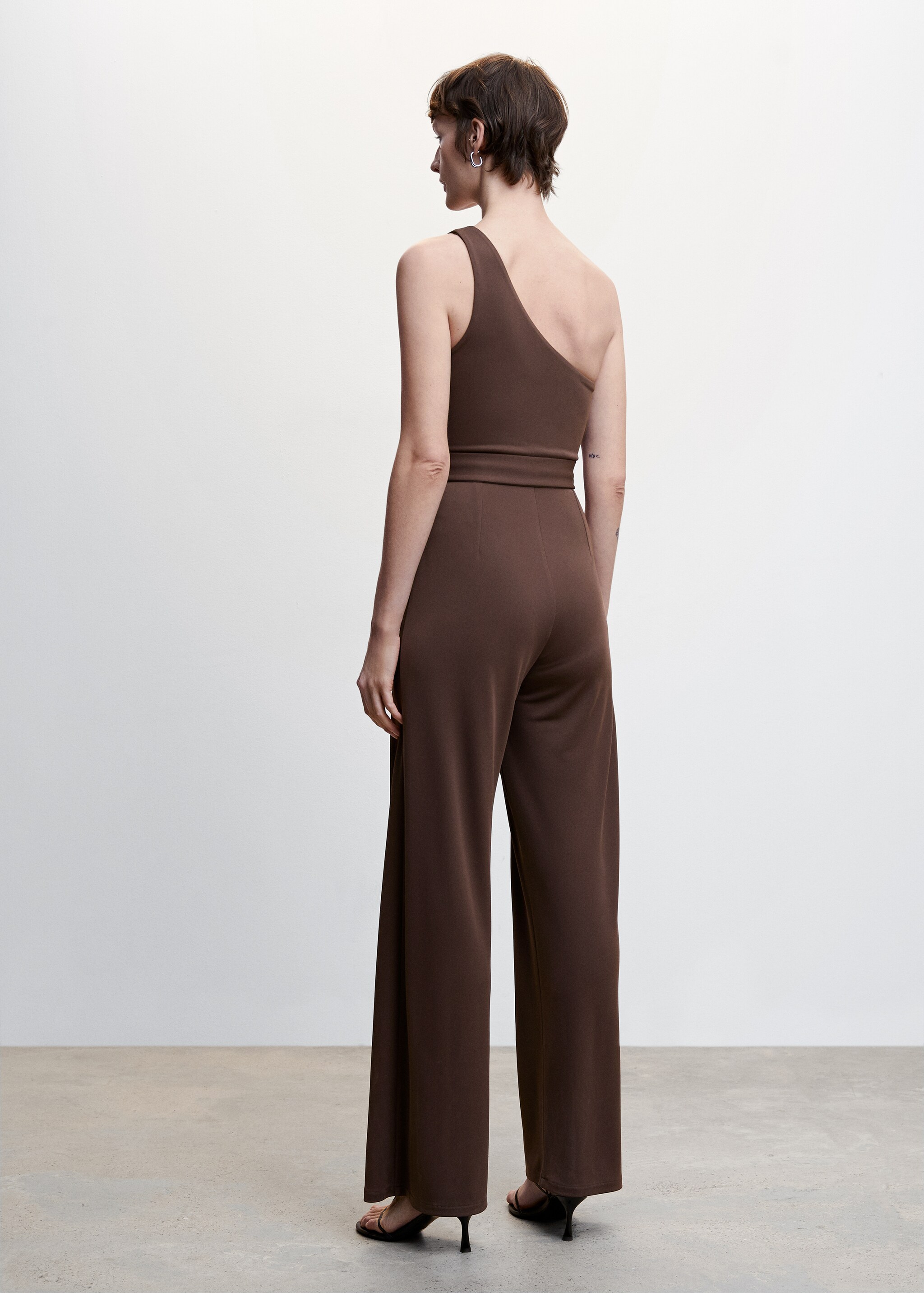 Asymmetrical jumpsuit with bow - Reverse of the article