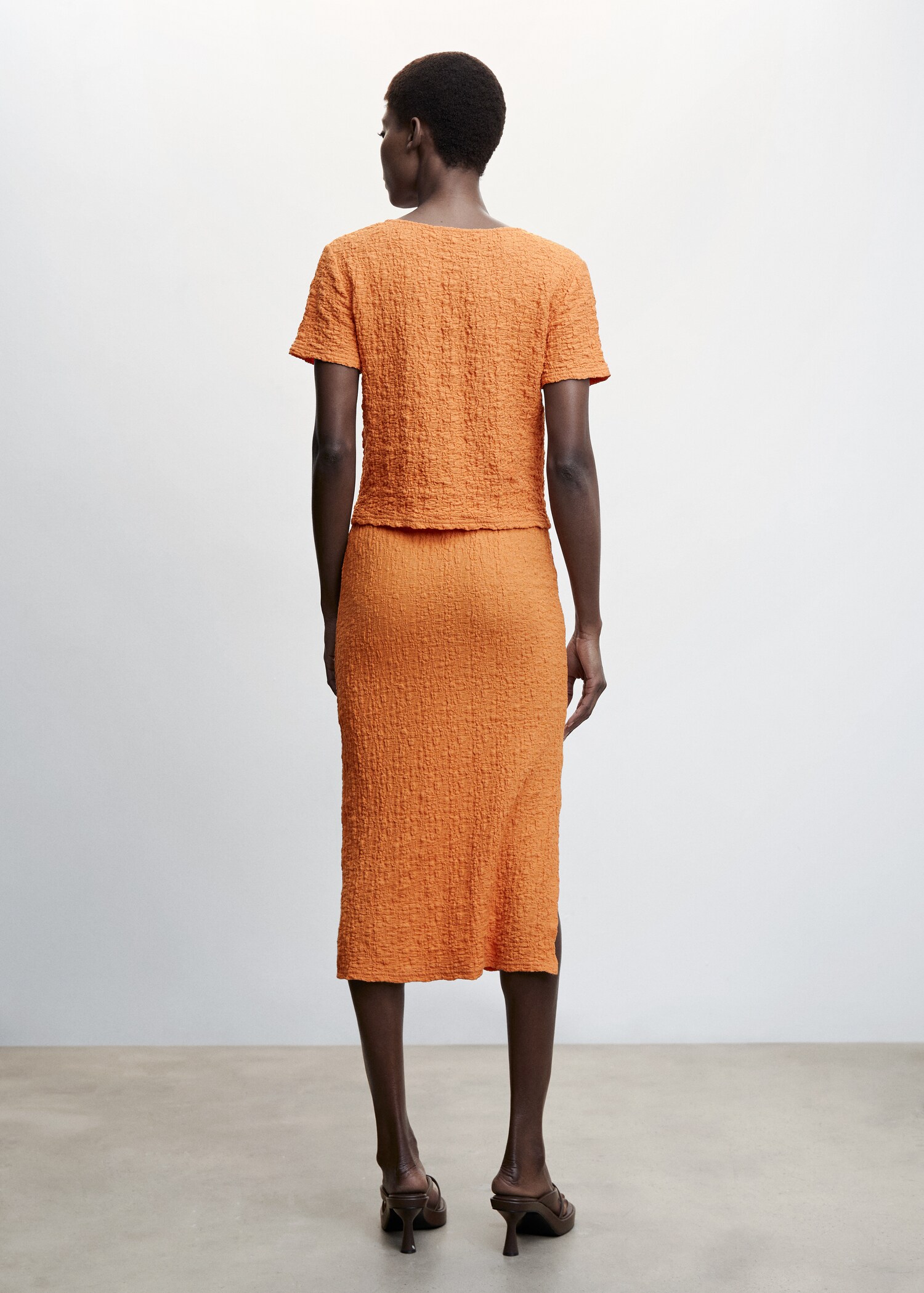 Open textured skirt - Reverse of the article