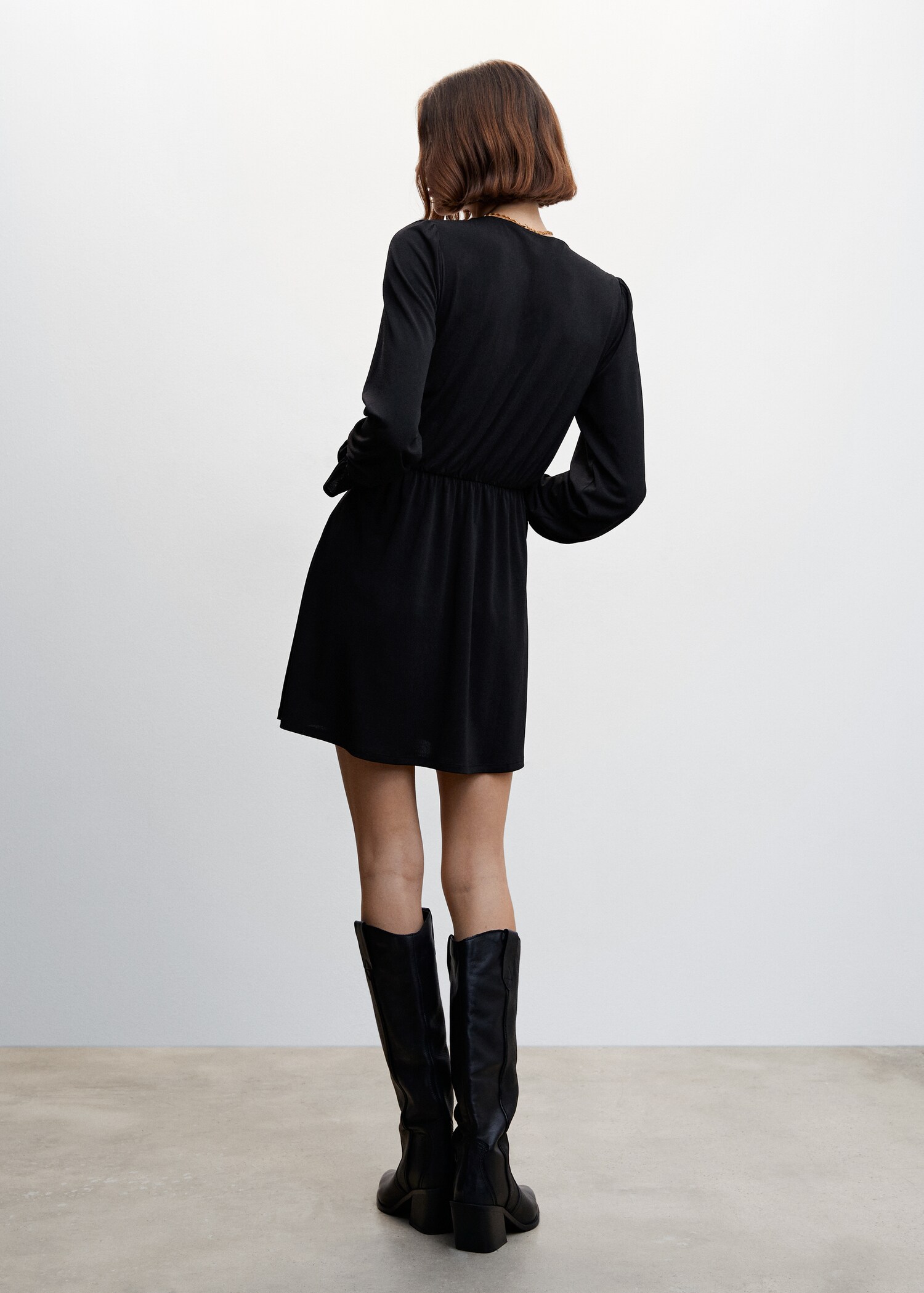 Short ruffled dress - Reverse of the article