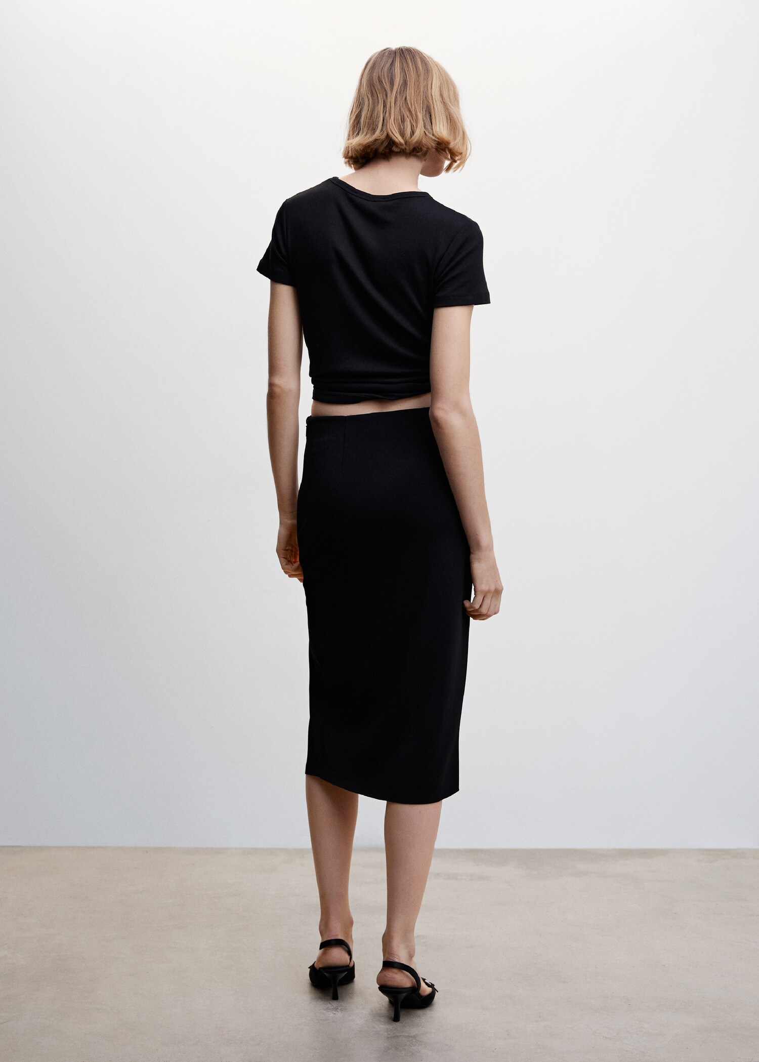 Opening pencil skirt - Reverse of the article