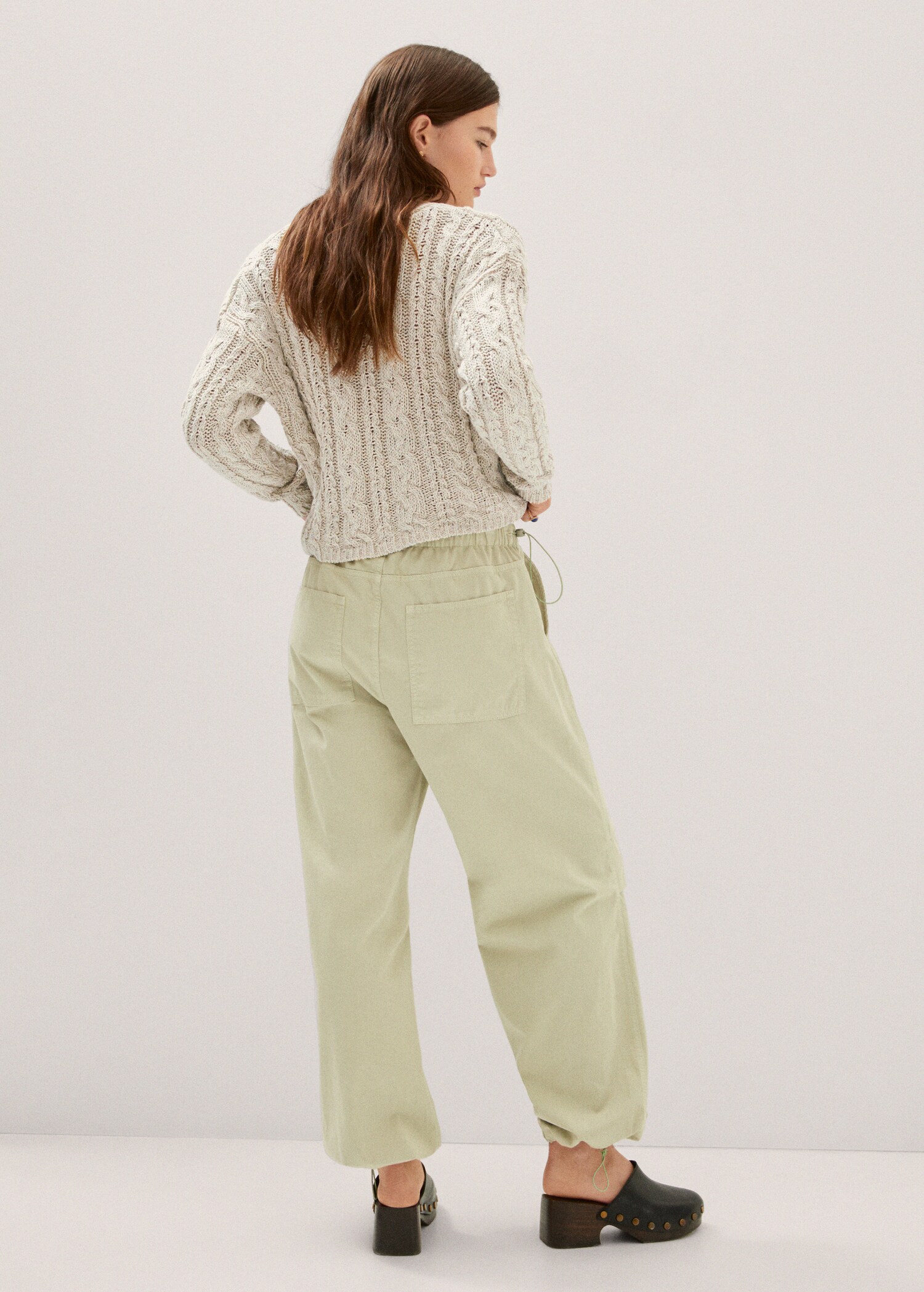 Buttoned knit braided cardigan - Reverse of the article