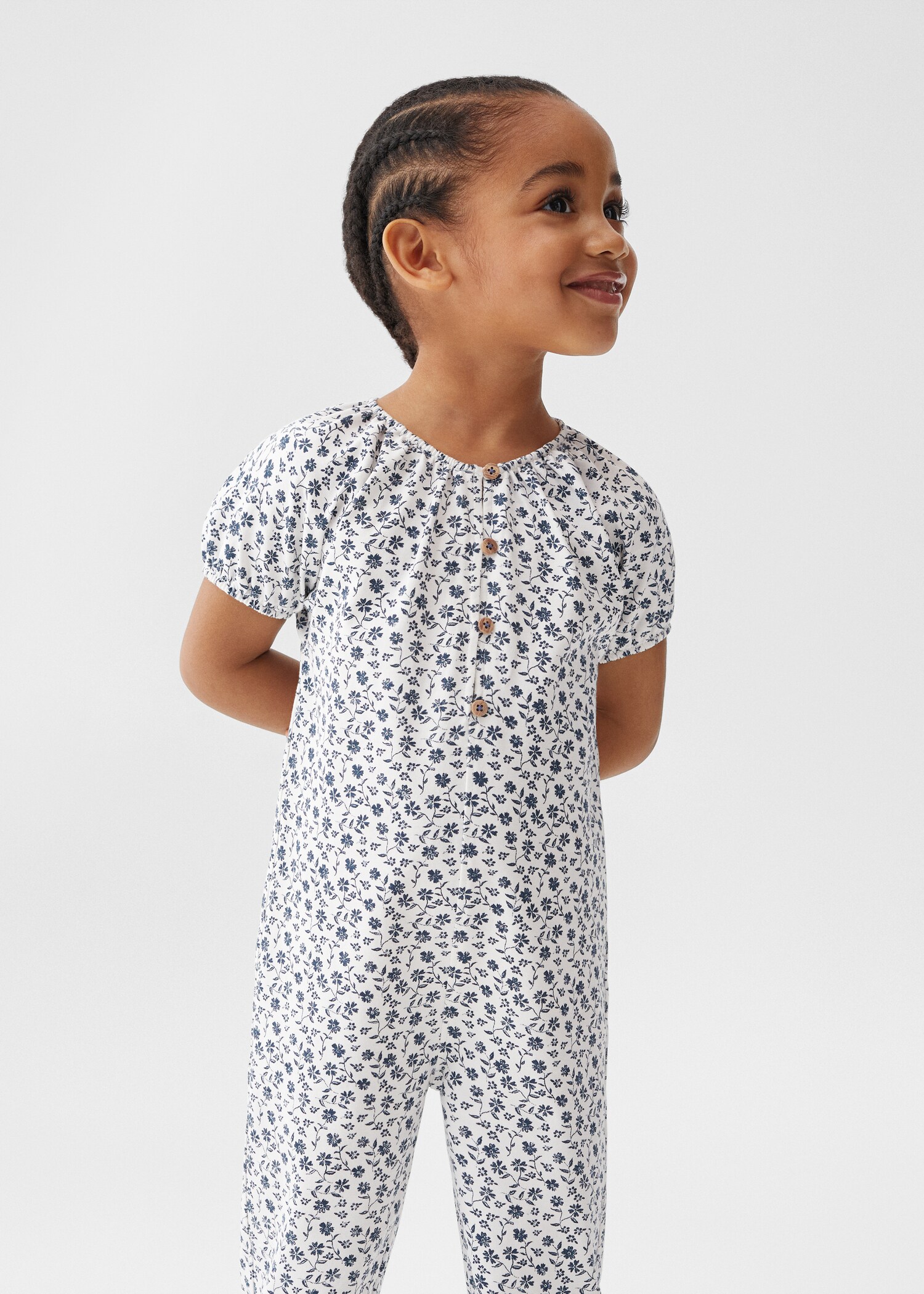 Combi-pantalon à fleurs - Plan moyen
