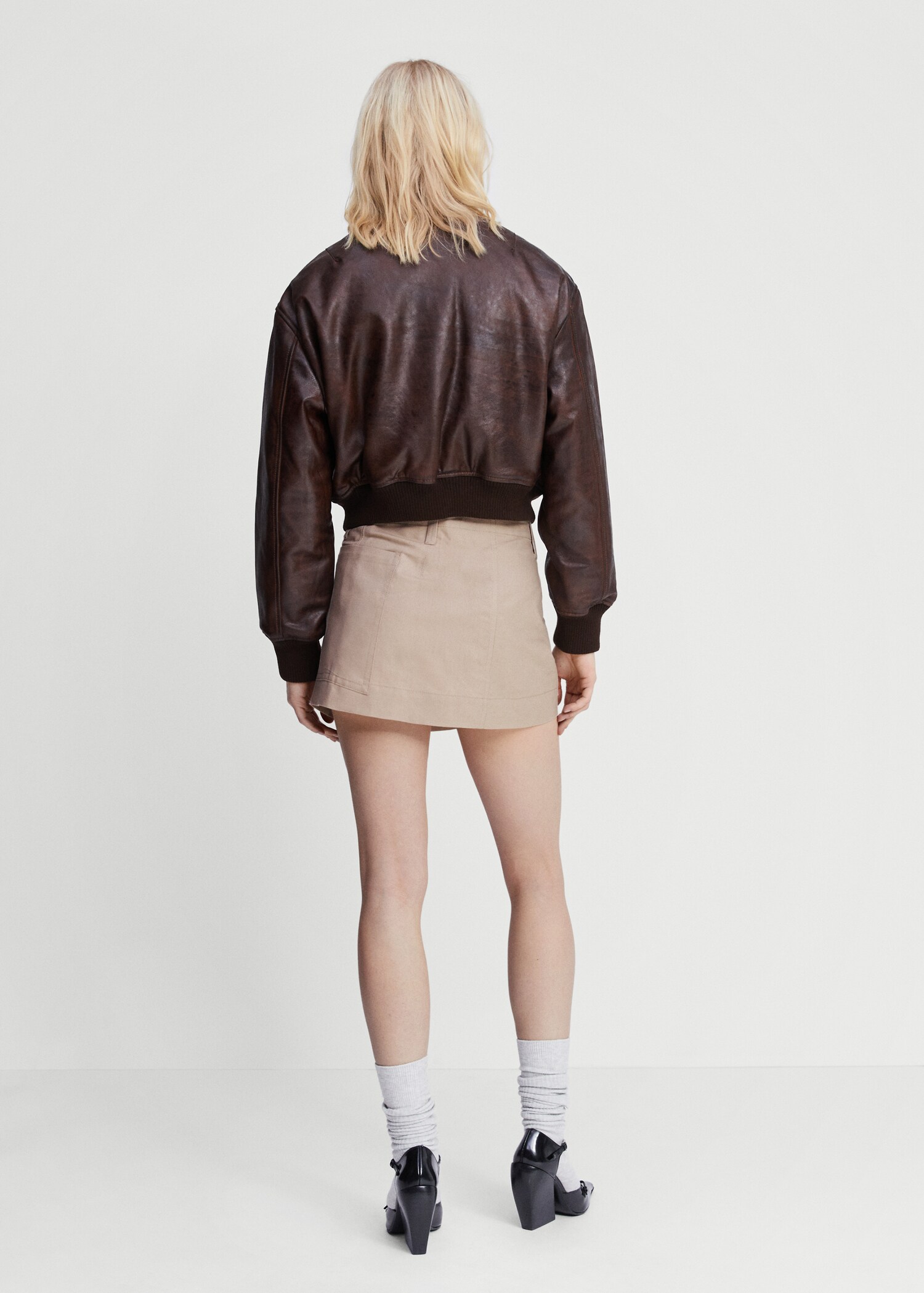 Wrap mini-skirt with pockets - Reverse of the article