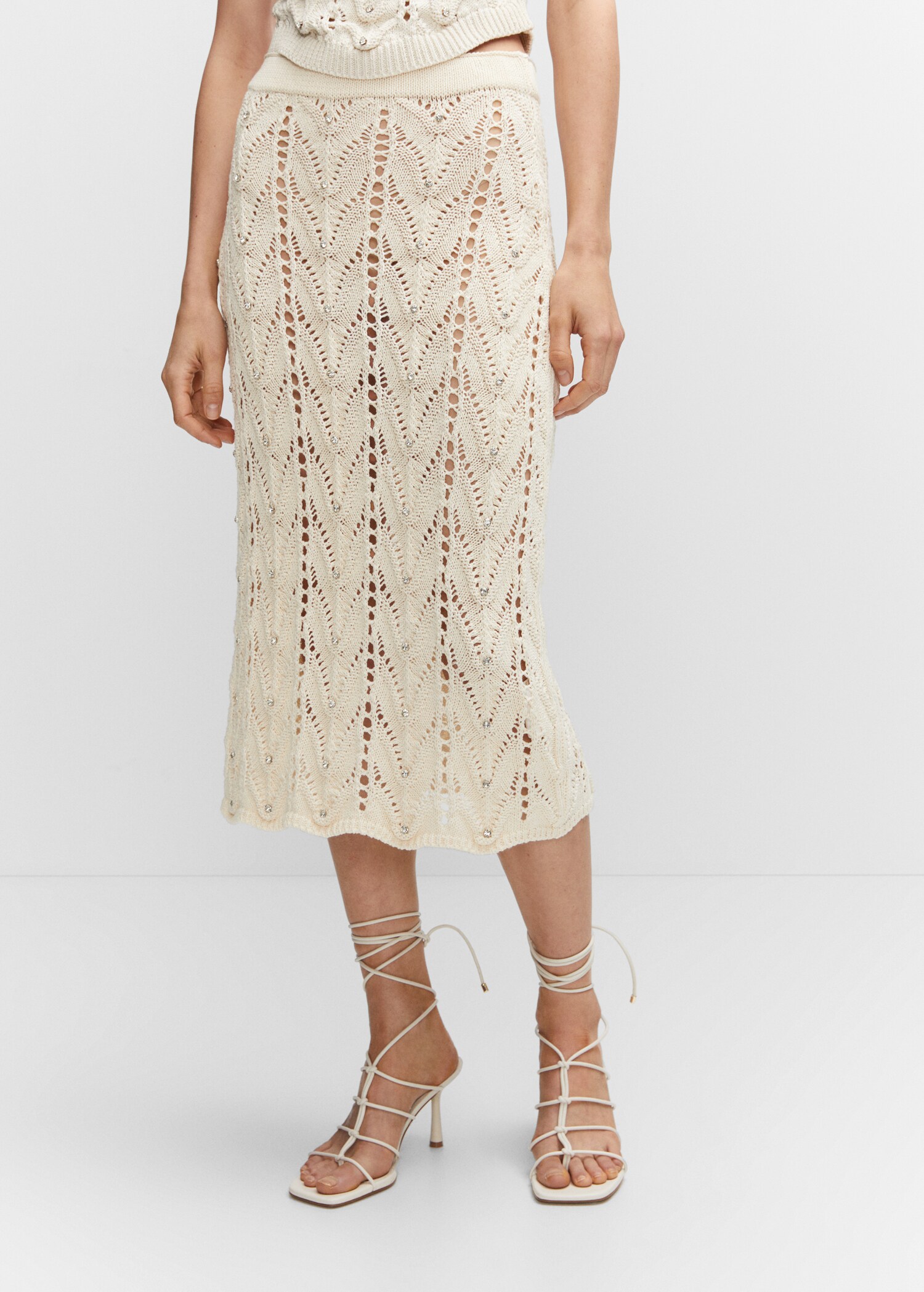 Knitted skirt with rhinestone detail - Medium plane