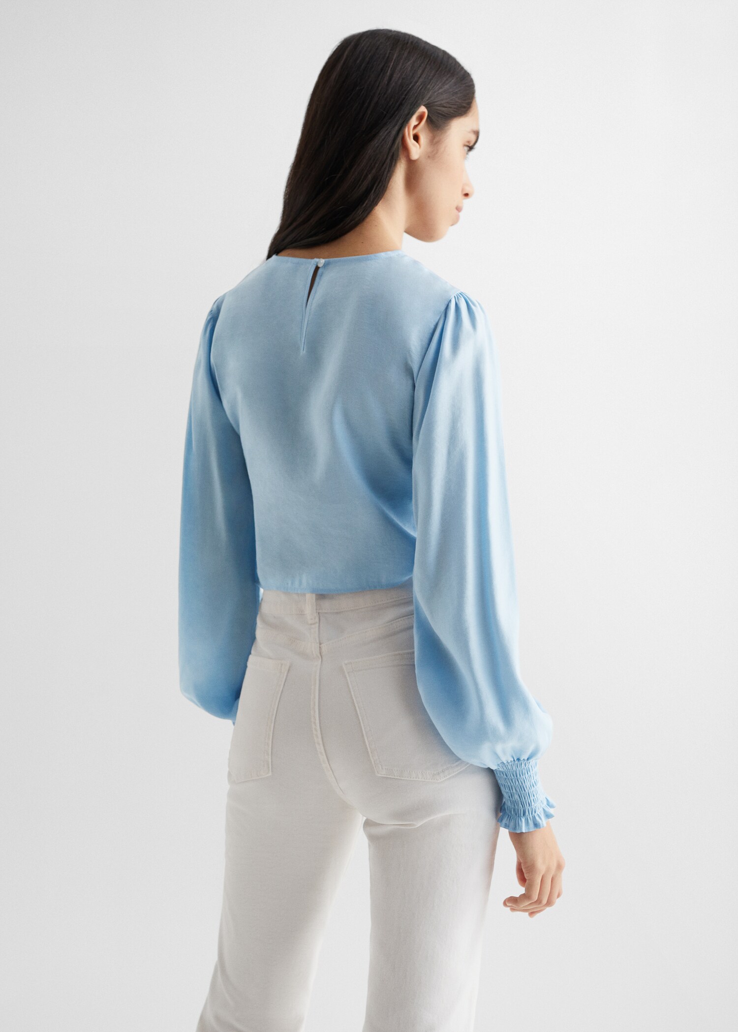 Blusa cruzada - Reverso del artículo