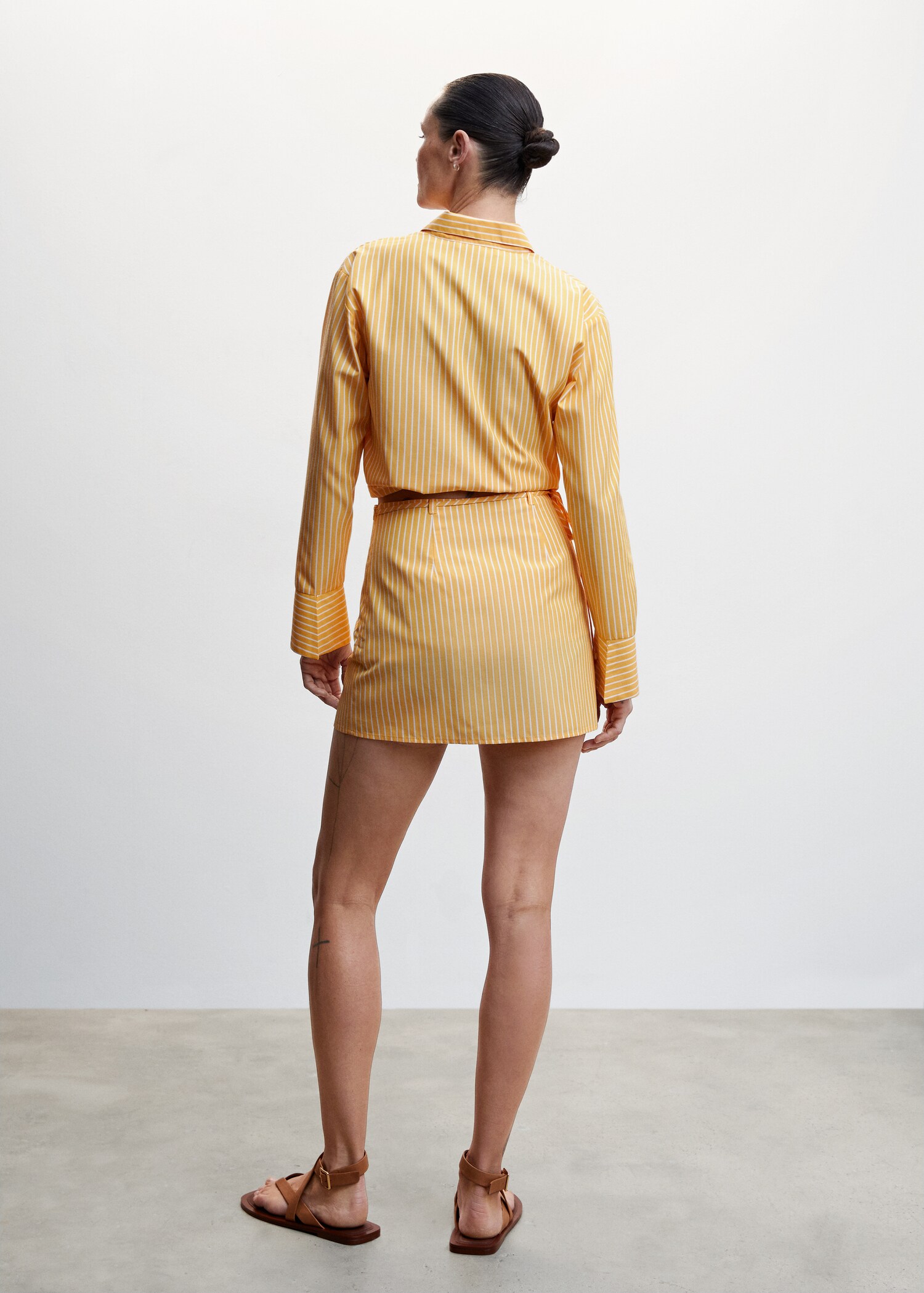 Striped short skirt - Reverse of the article