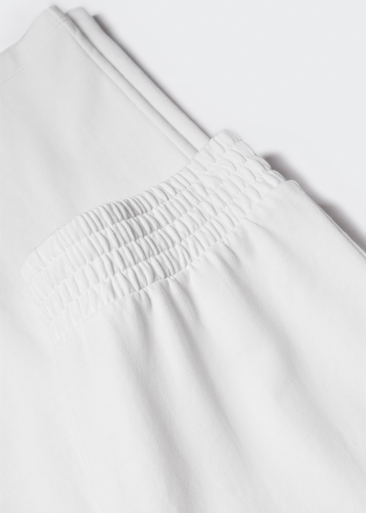 Knit jogger-style trousers - Details of the article 8