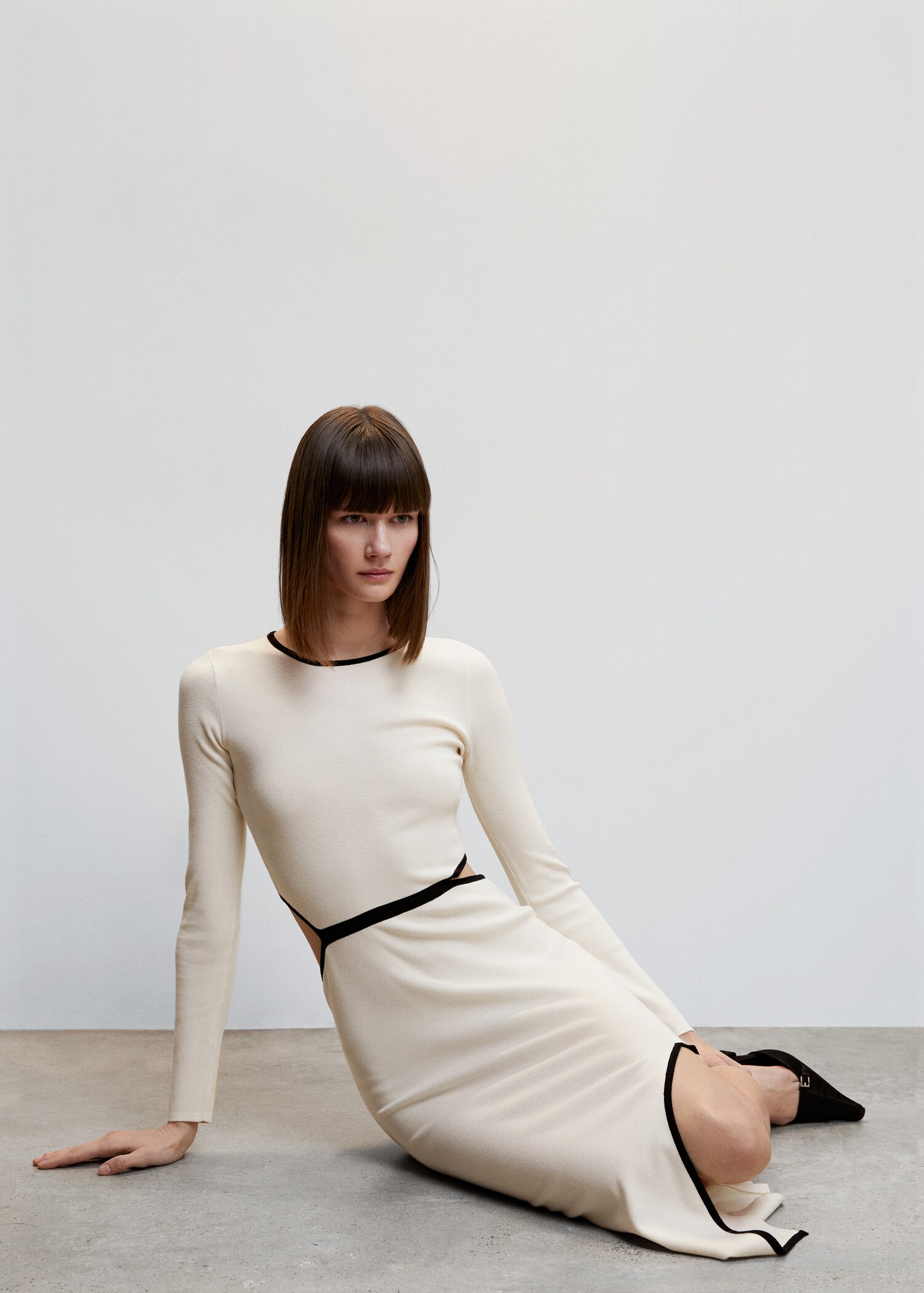 Knitted dress with openings - Details of the article 1
