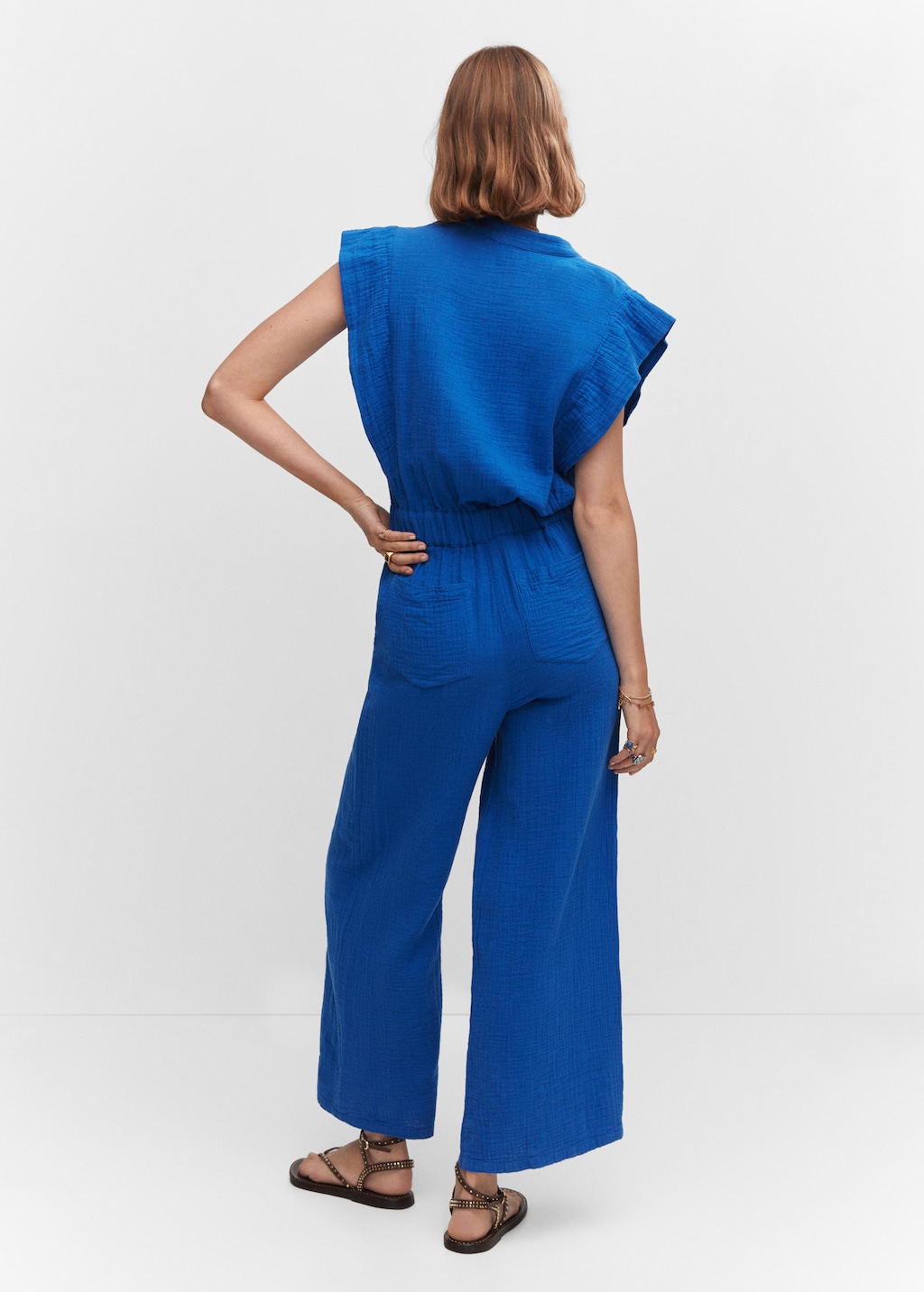 Textured jumpsuit with button Women MANGO OUTLET United Kingdom