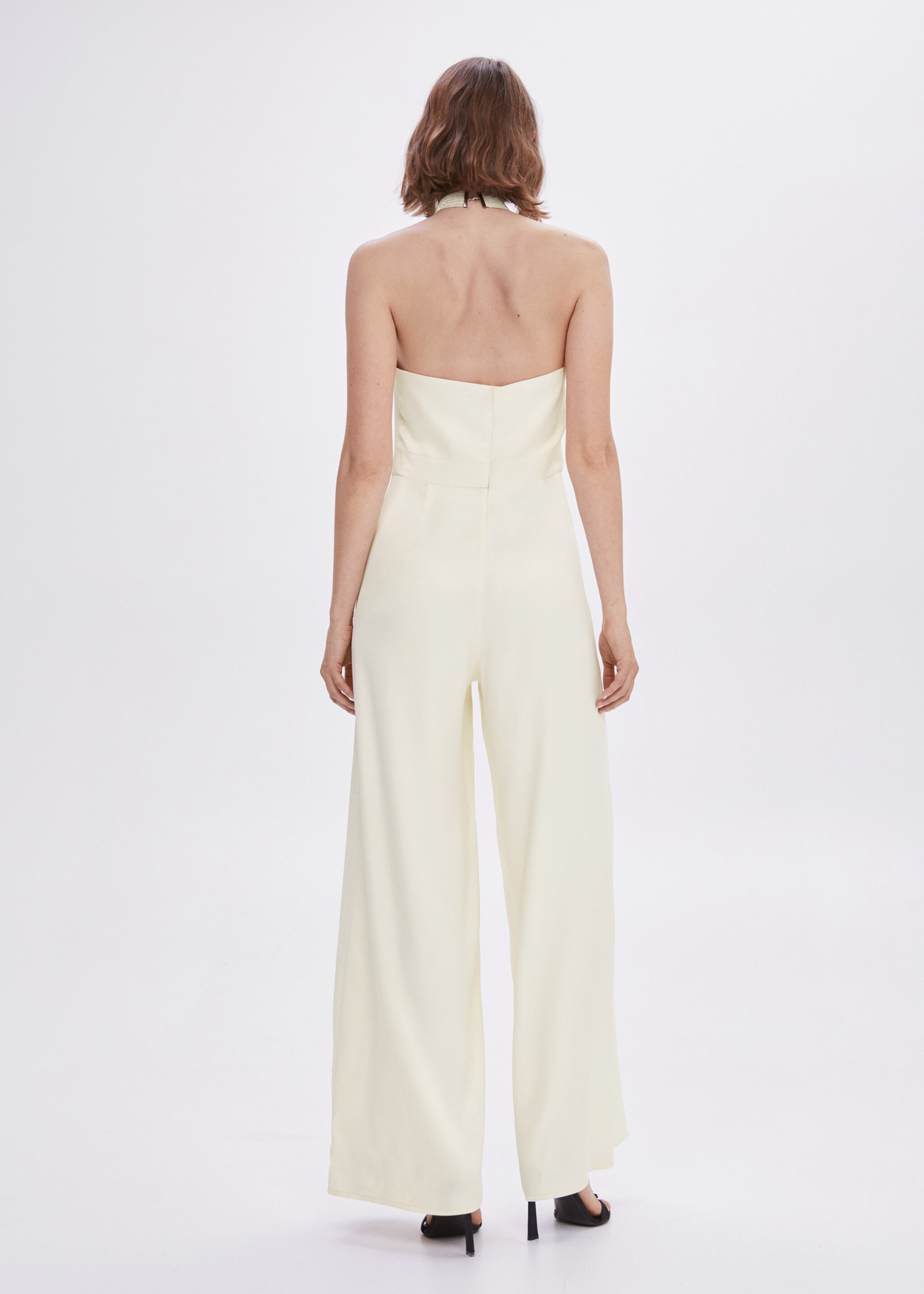 Halter-neck jumpsuit with metallic detail - Reverse of the article, Ecru. Ref: 57001089-00.