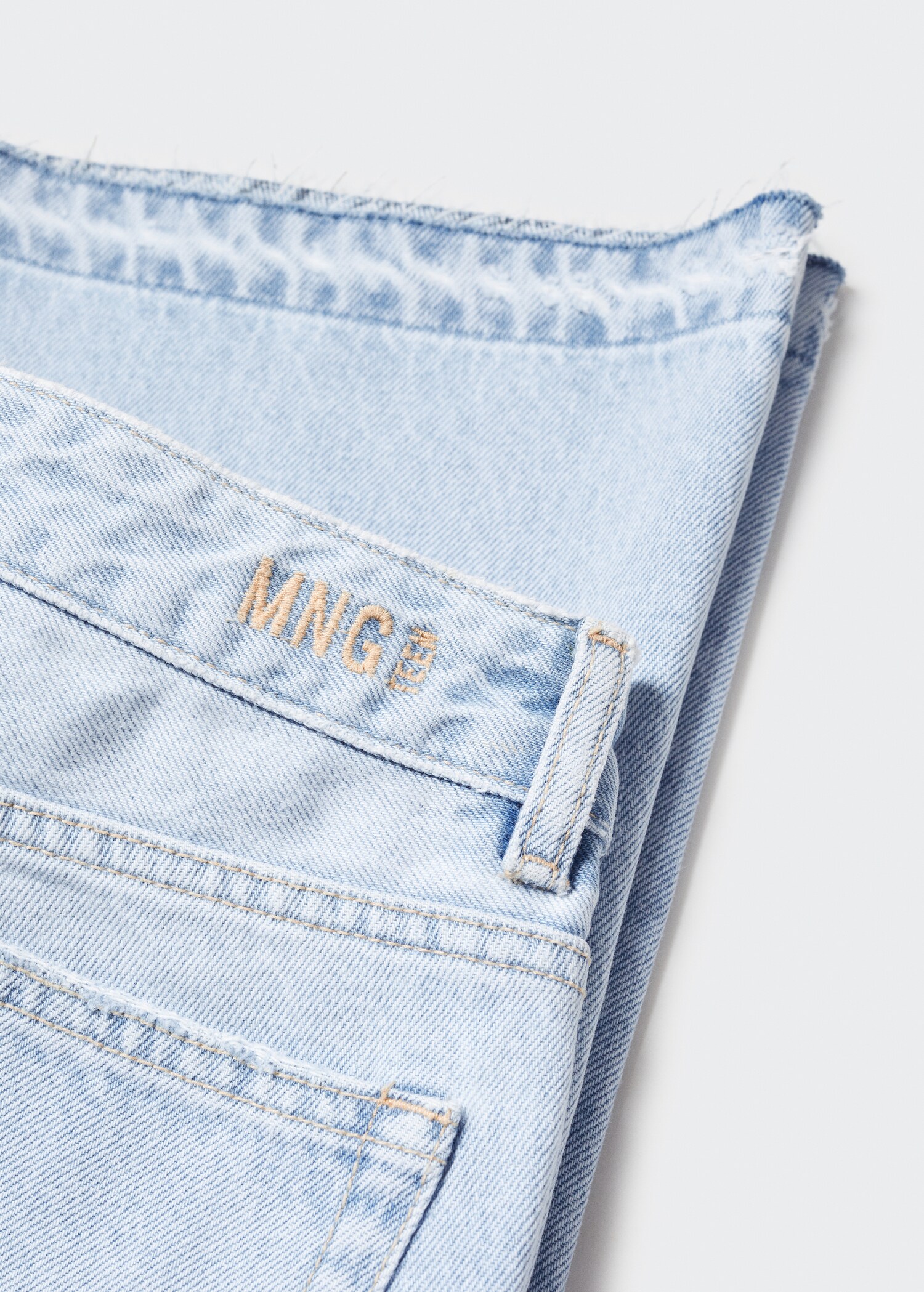 Flared jeans with decorative rips - Details of the article 8