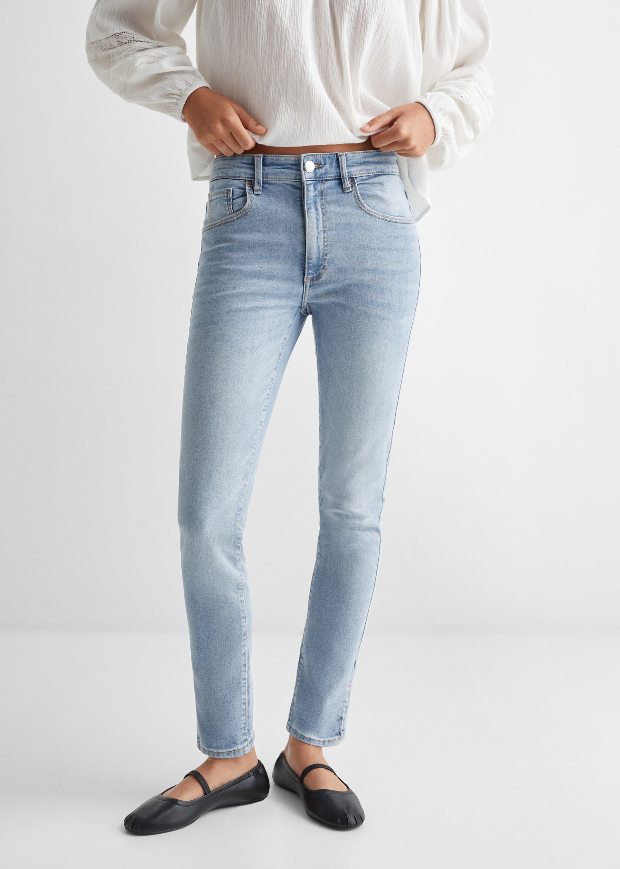 Skinny jeans with slit - Details of the article 6, Light Blue. Ref: 57003264-00.
