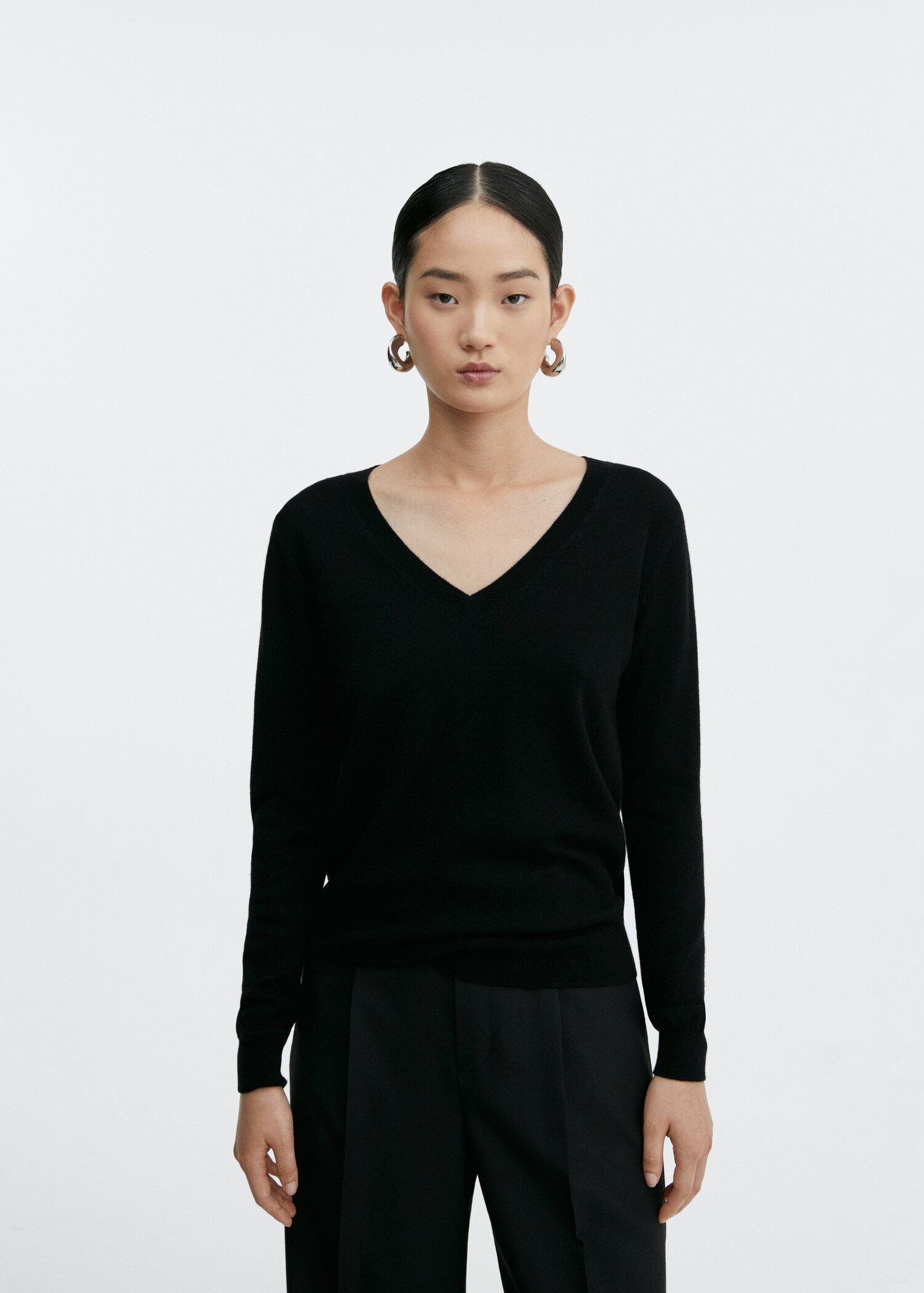 V-neck wool sweater - Medium plane