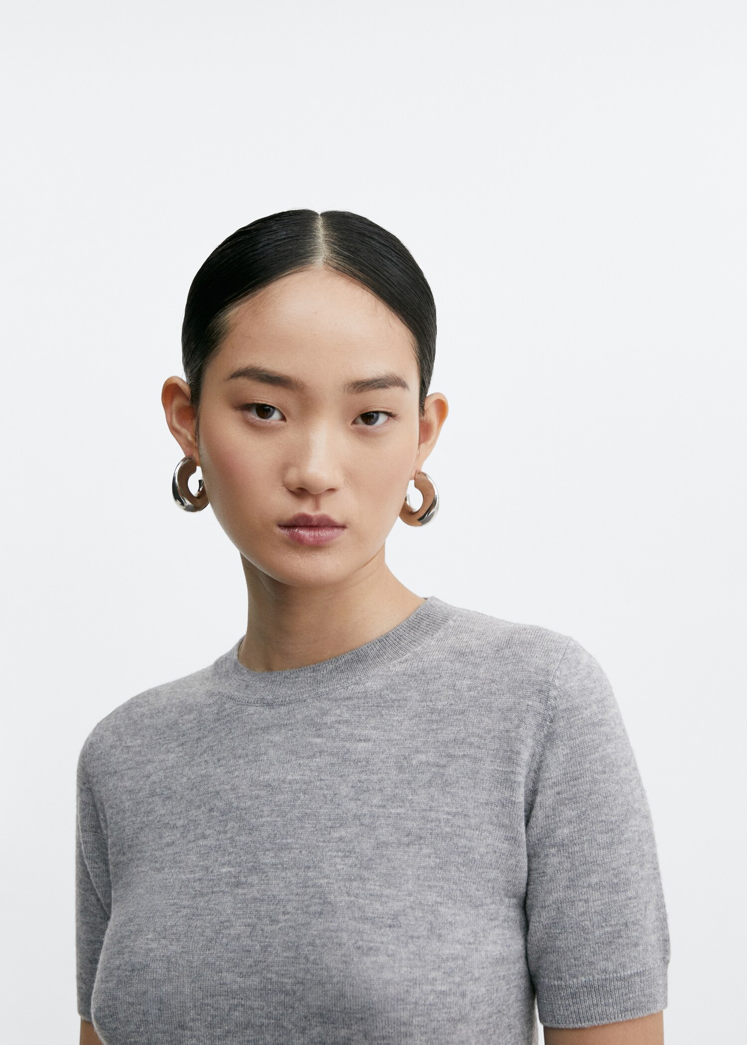 Short-sleeved wool sweater - Details of the article 1