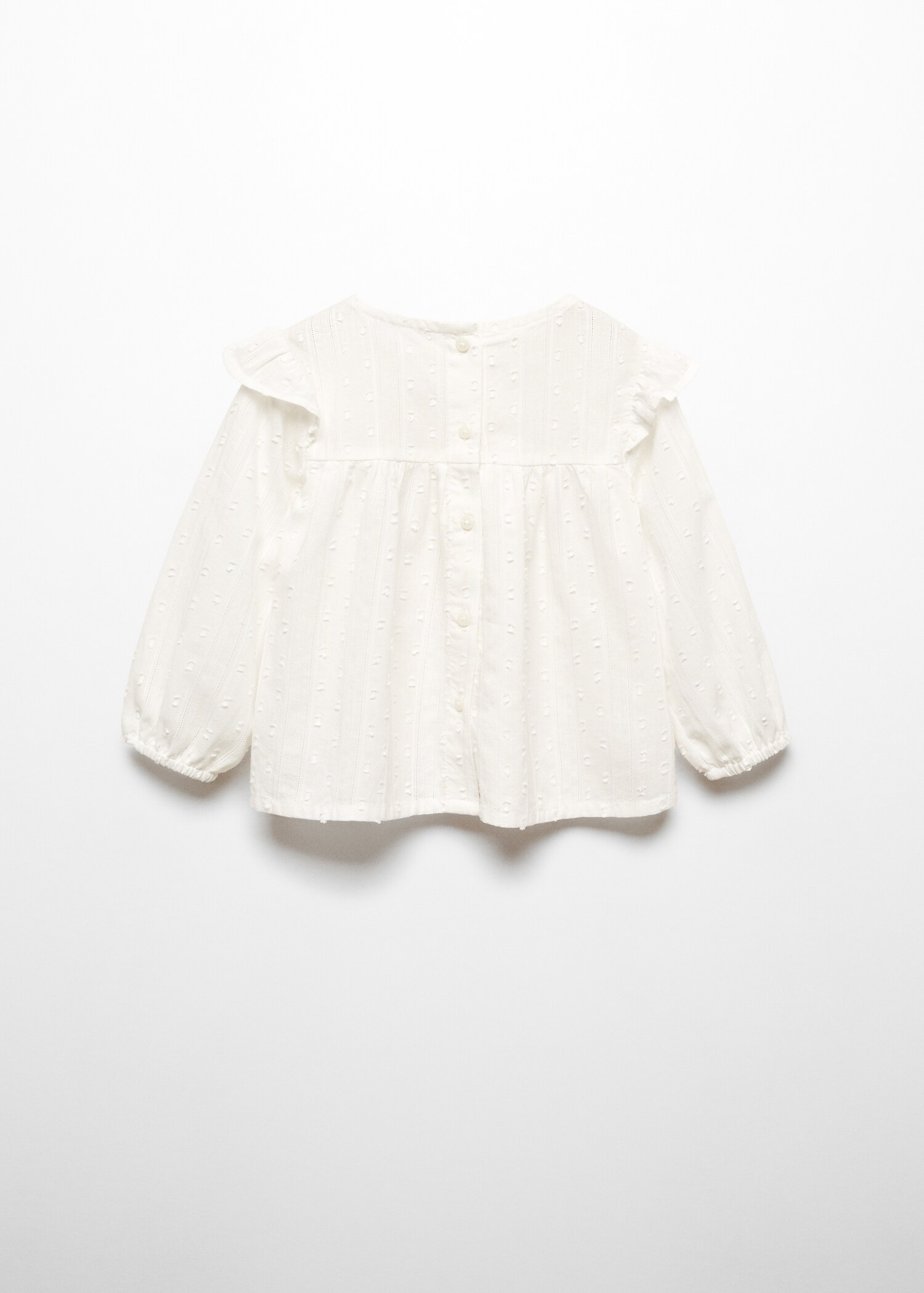 Blusa plumeti volantes - Reverso del artículo