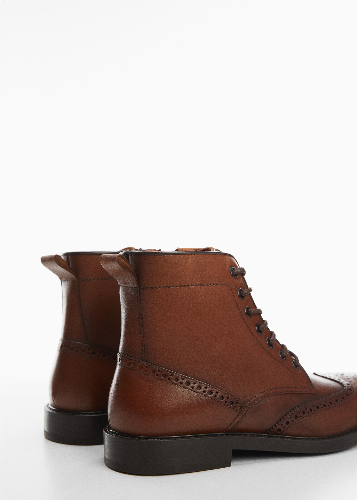 Die-cut leather ankle boots - Details of the article 1