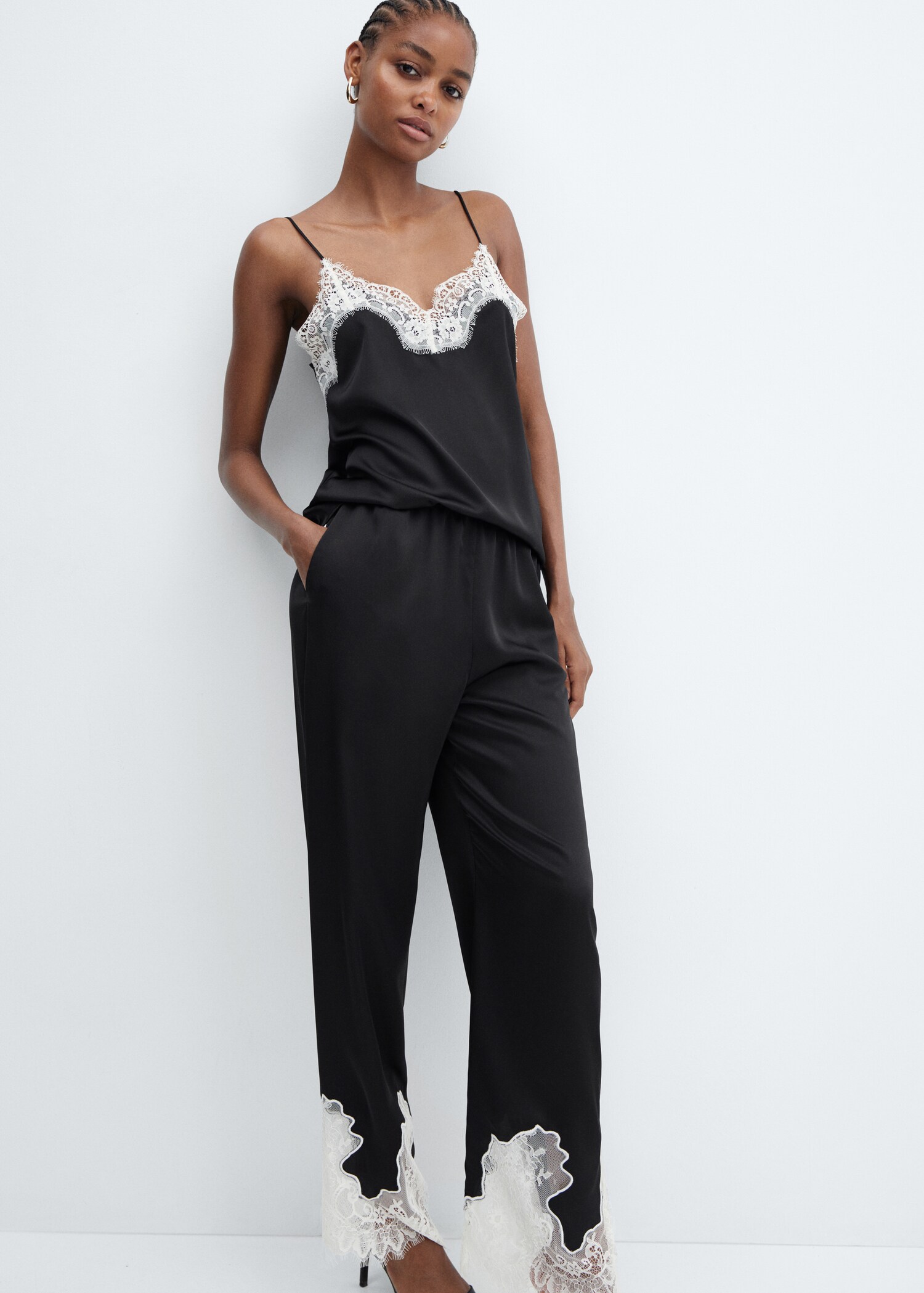 Trousers with lace hem detail - Details of the article 1