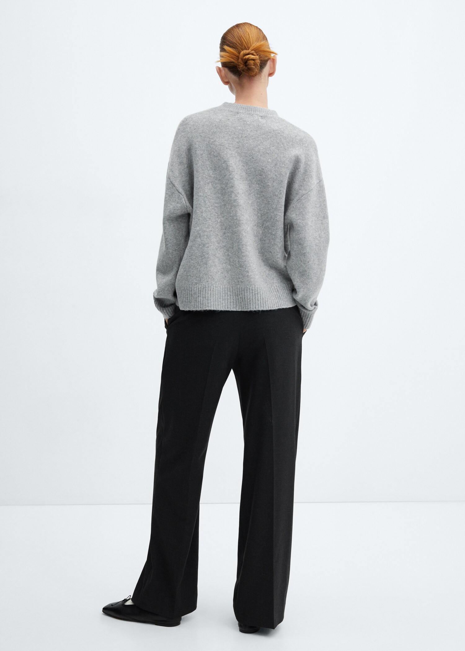 Round-neck knitted sweater - Reverse of the article