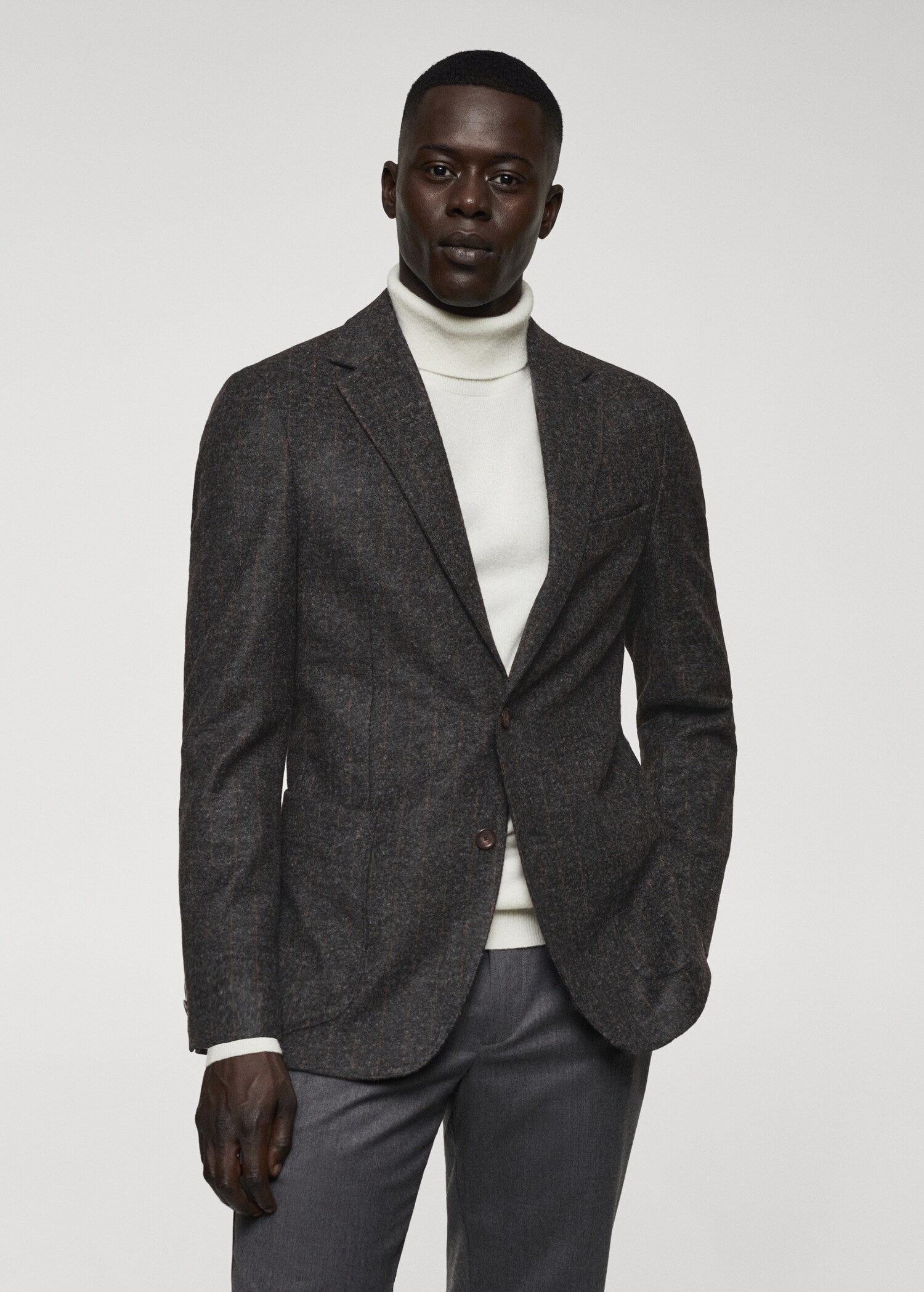 Kritstrecksrandig kavaj ren ny ull - Bild av mittparti