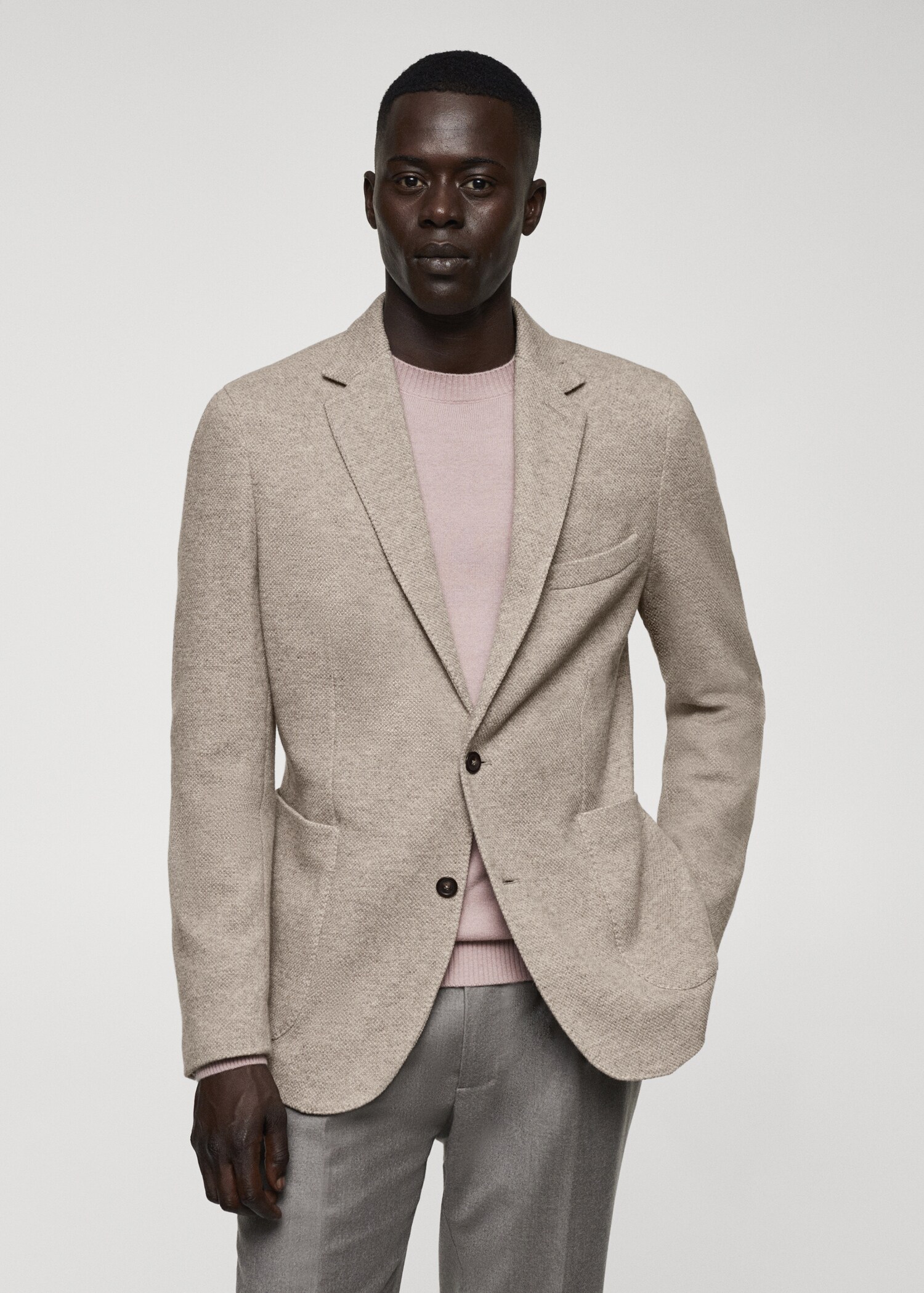 Stickad kavaj ren ny ull - Bild av mittparti