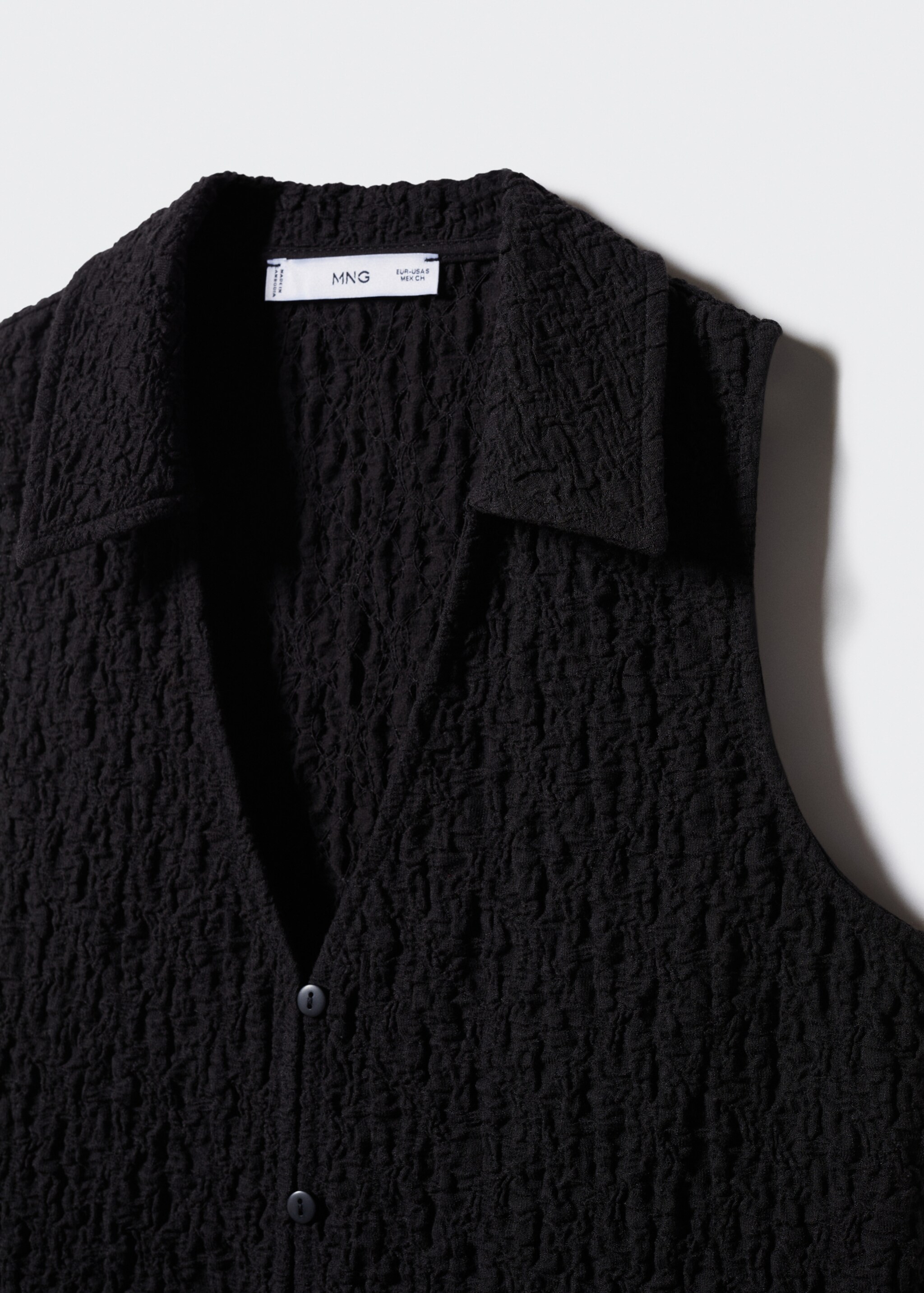 Textured polo neck gilet - Details of the article 8, Black. Ref: 57010277-00.