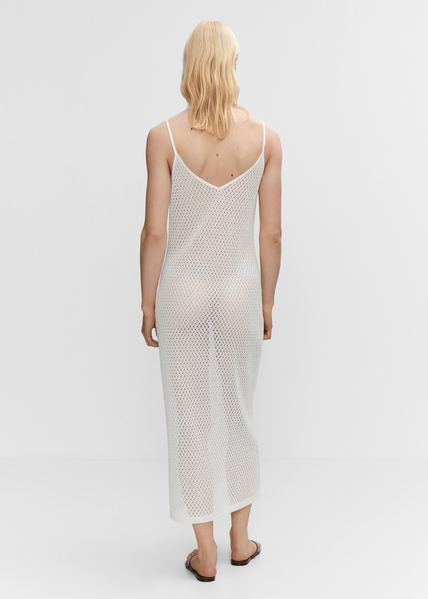Long openwork knitted dress - Reverse of the article