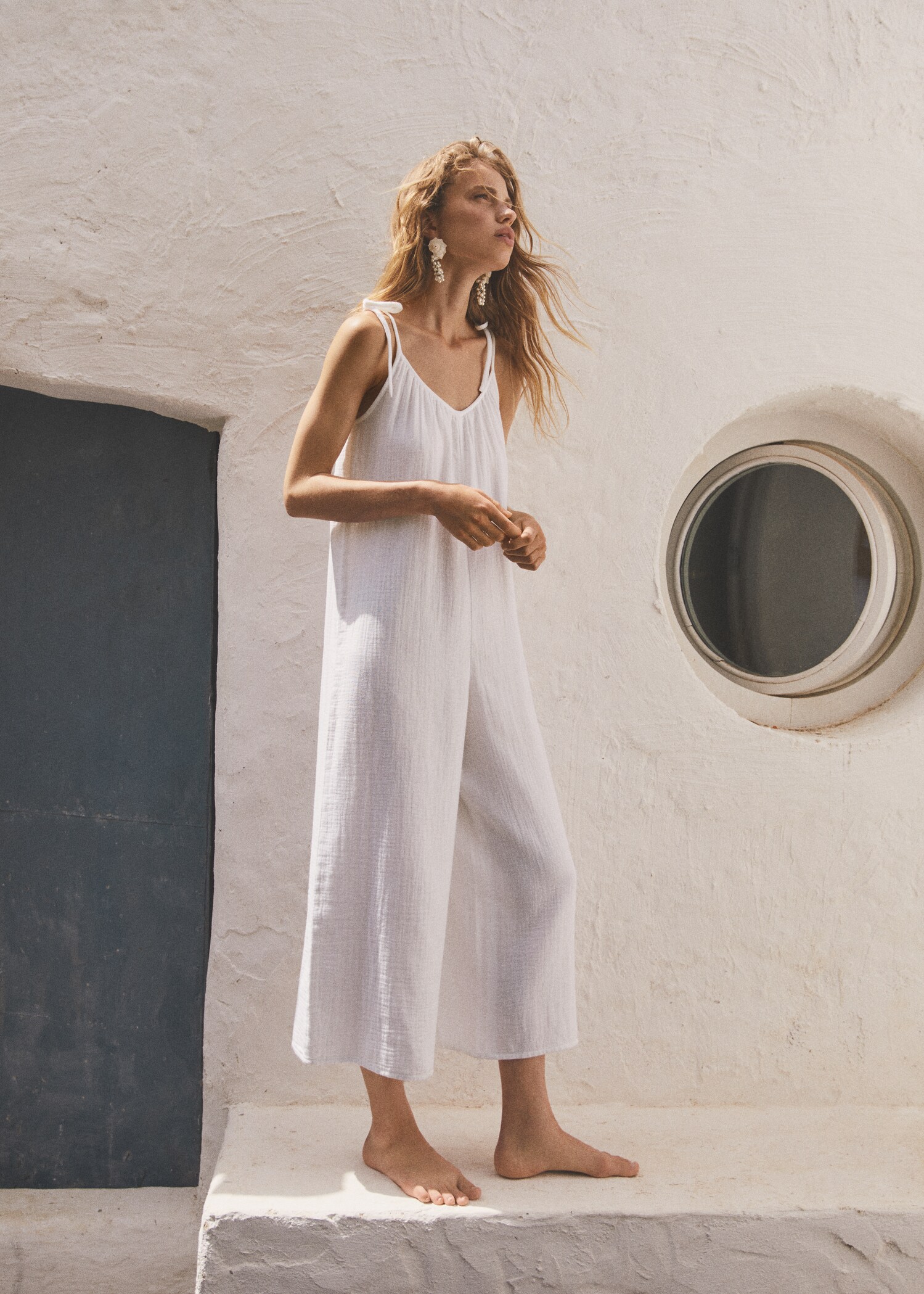 Textured jumpsuit with bows - Details of the article 7