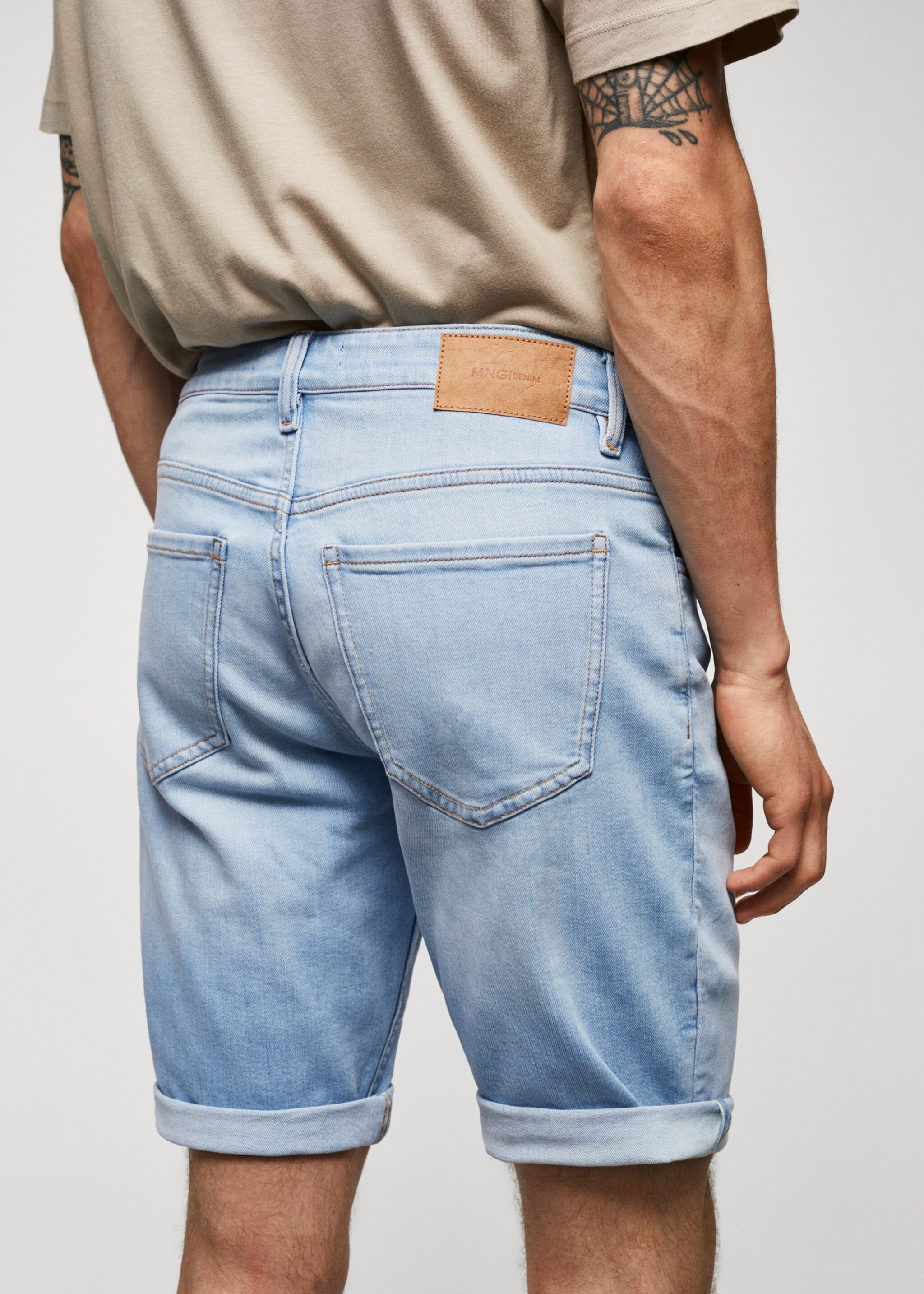 Slim-fit denim bermuda shorts - Details of the article 6, Light Blue. Ref: 57010683-00.