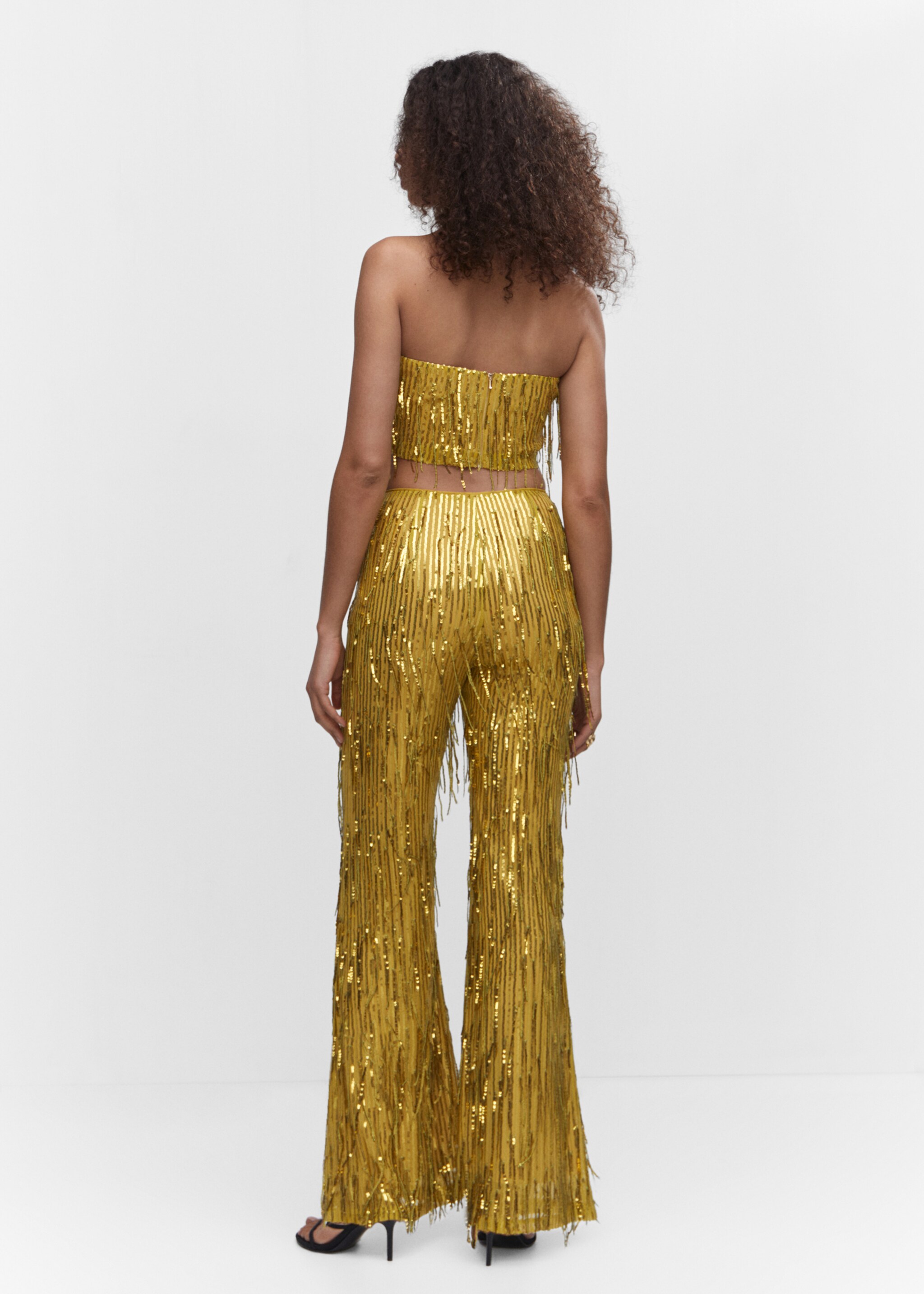 Pantalon franges métallisées - Verso de l’article