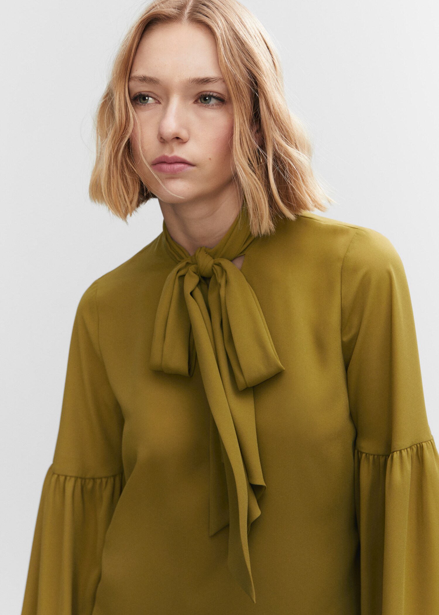 Blouse with puffed sleeves and bow - Details of the article 1