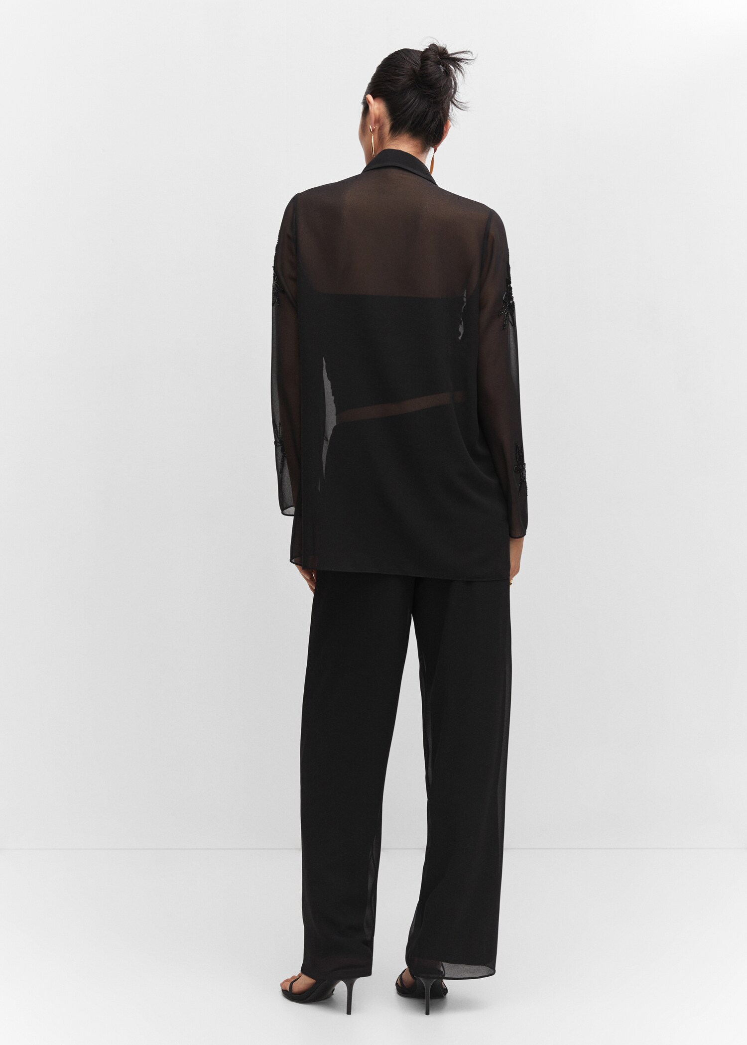 pants with bead detail - Reverse of the article