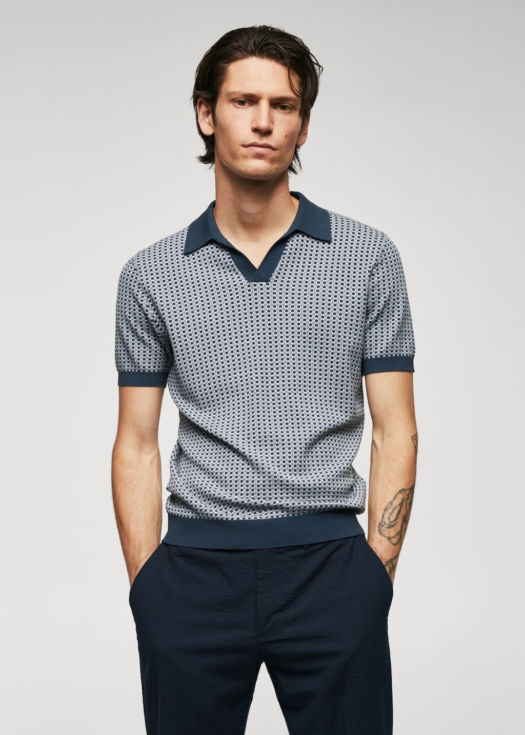 Fine knit polo shirt with geometric structure Men MANGO OUTLET Finland