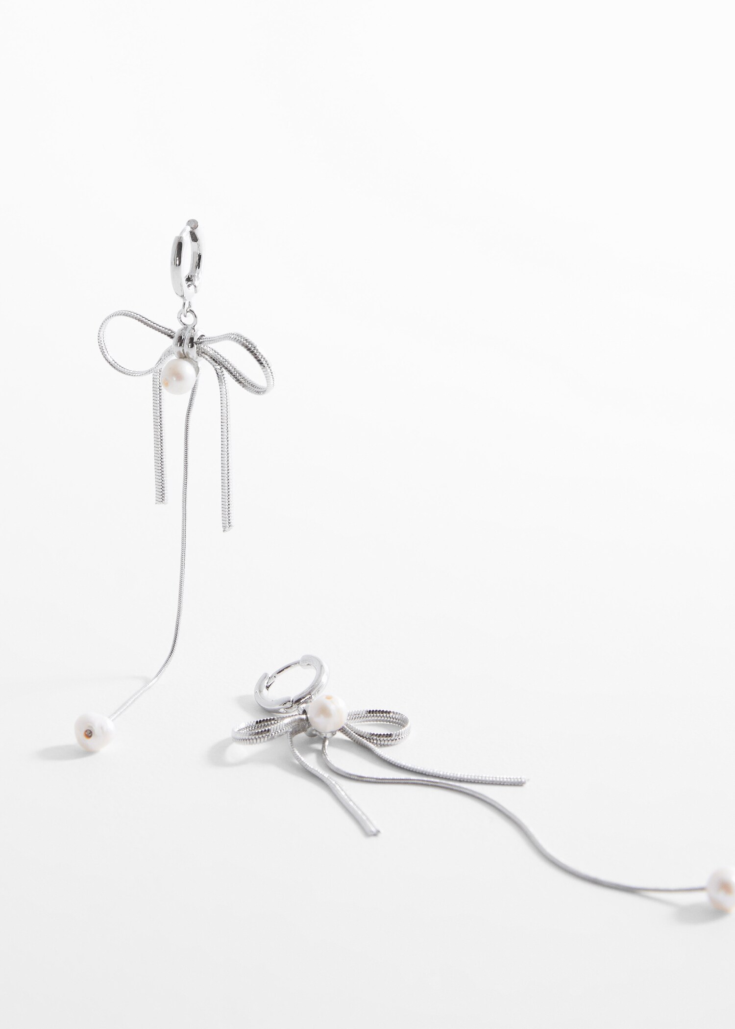 Pearl bow earrings - Medium plane