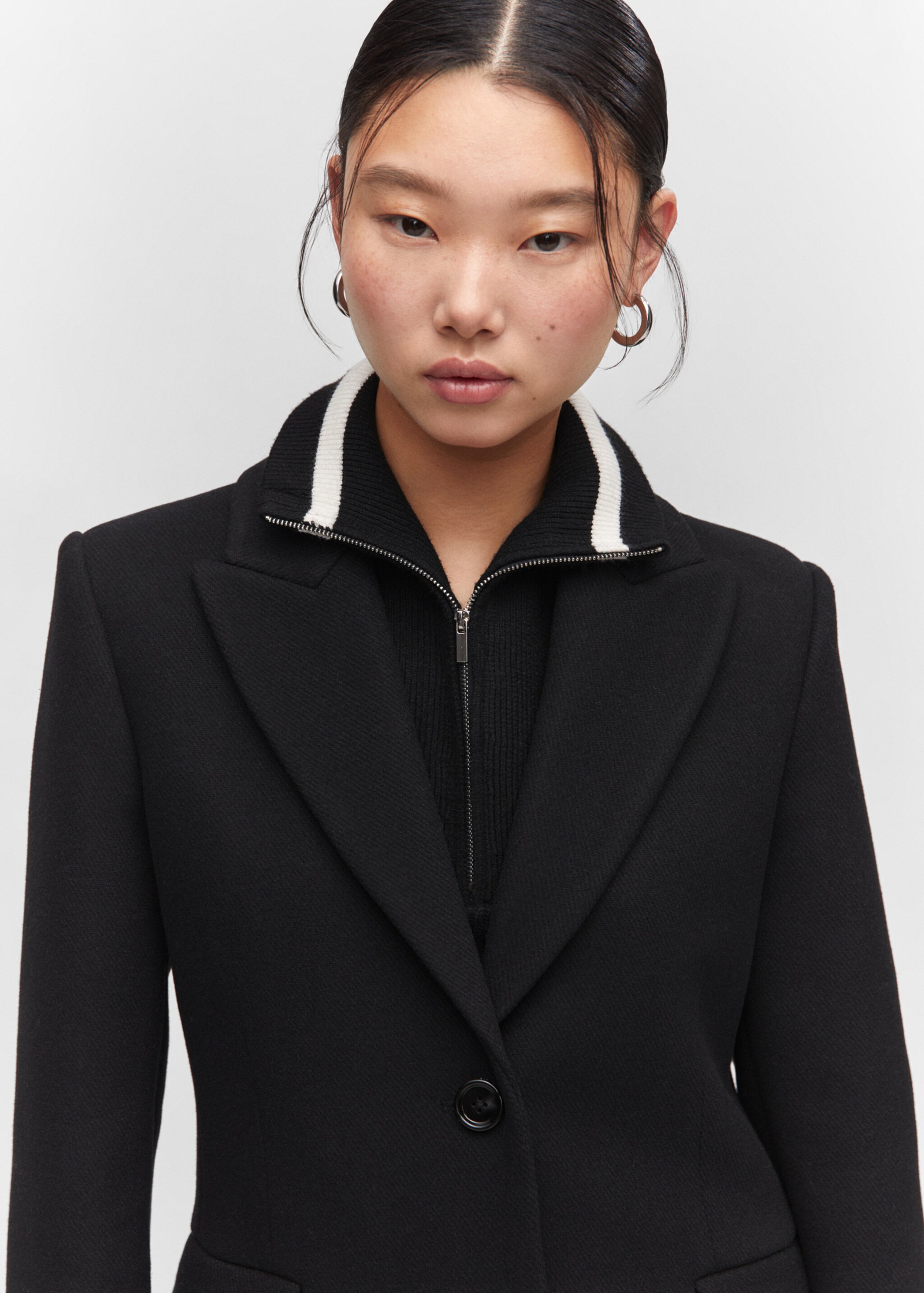 Manteau droit à revers - Détail de l'article 1