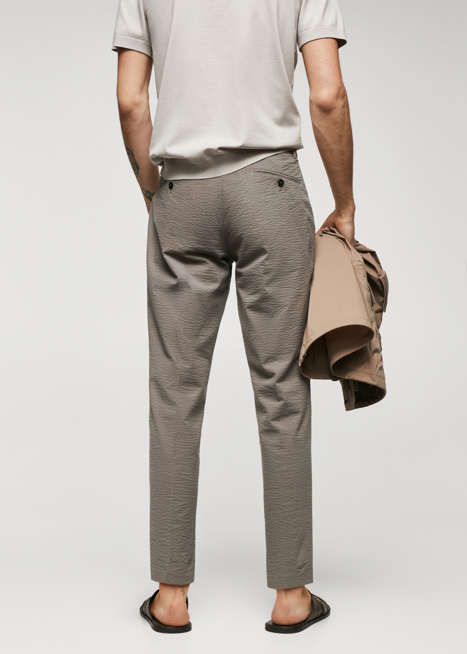 Slim-fit seersucker stretch trousers - Reverse of the article