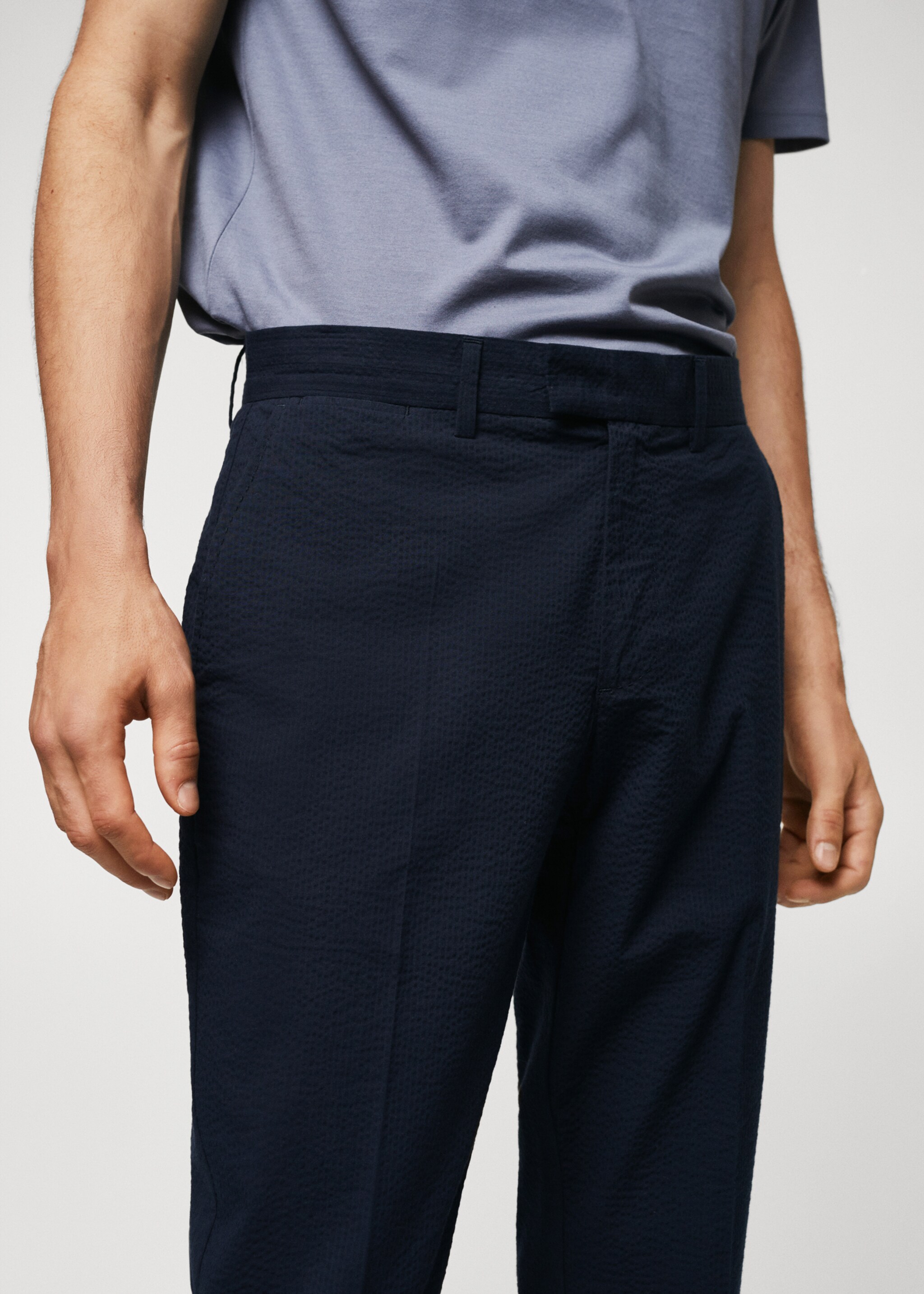 Slim-fit seersucker stretch trousers - Details of the article 1, Navy. Ref: 57022507-00.