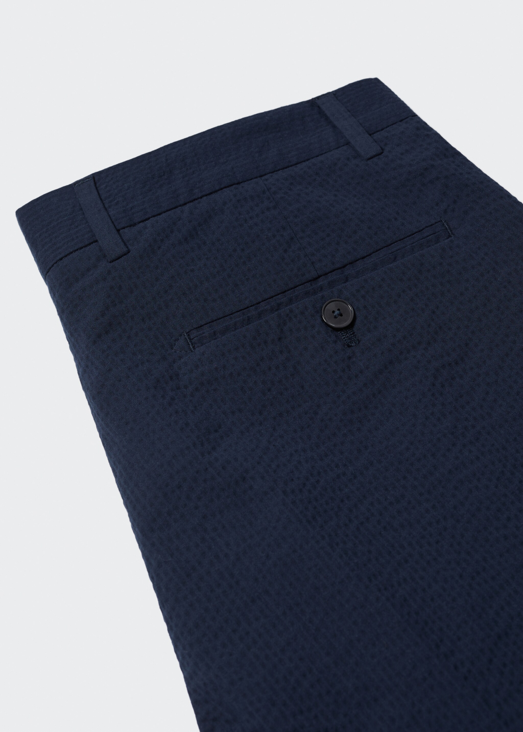 Slim-fit seersucker stretch trousers - Details of the article 8, Navy. Ref: 57022507-00.